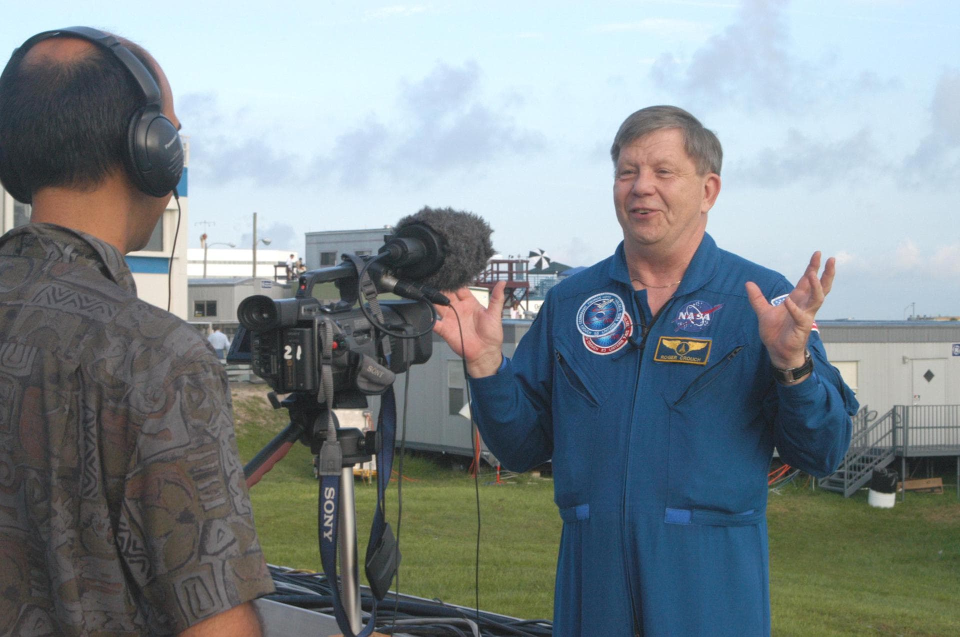 KENNEDY SPACE CENTER, FLA. -    Roger Crouch, a payload specialist, talks to the media prior to the launch at 3:51 p.m. of Space Shuttle Discovery on the historic Return to Flight mission STS-114.  He