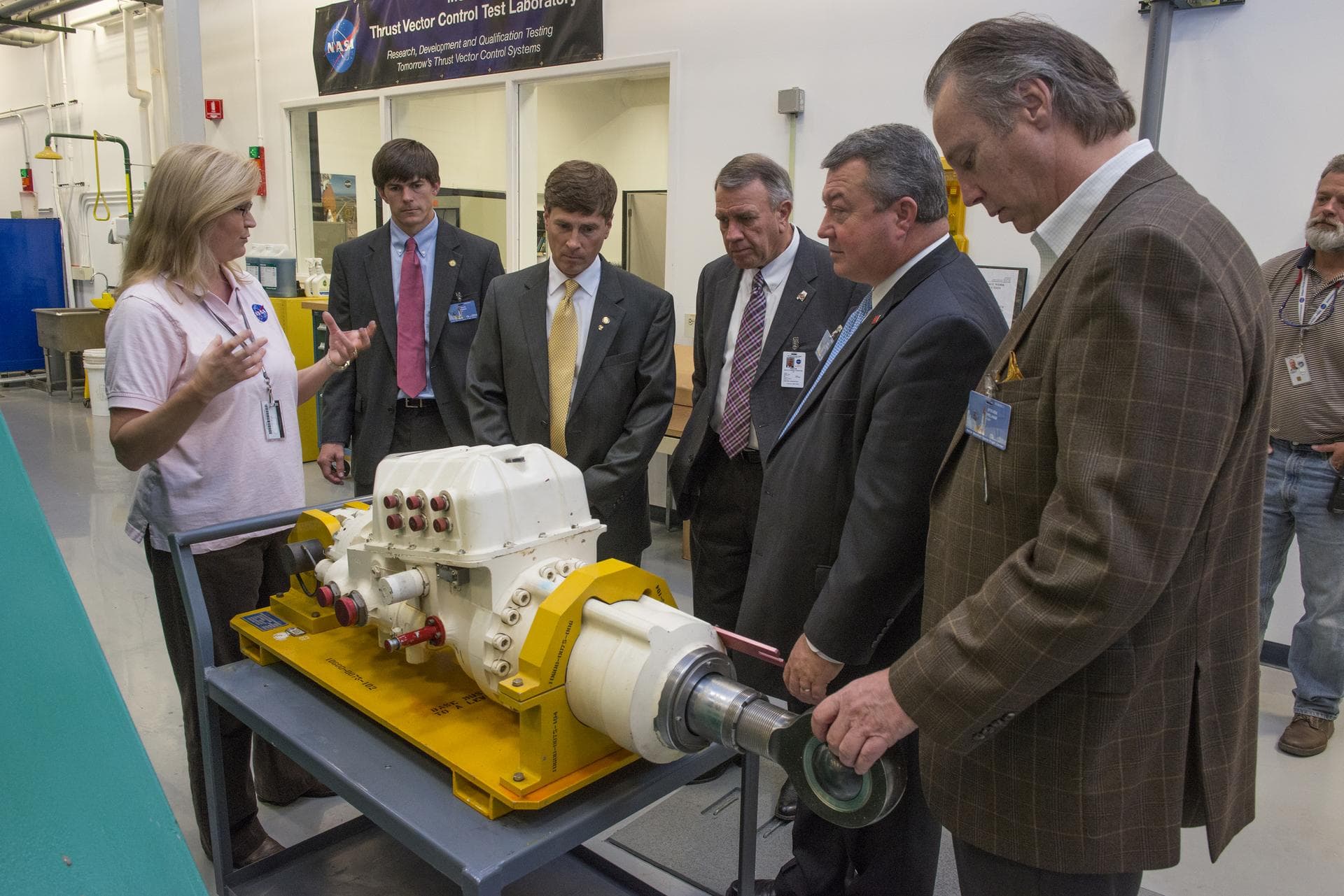 LISA BATES PROVIDES AN OVERVIEW OF THRUST VECTOR CONTROL  TO STATE SENATOR BILL HOLTZCLAW, REPRESENTATIVE MAC MCCUTCHEON, GREG CANFIELD OF THE ALABAMA DEPARTMENT OF COMMERCE, GOVERNOR BENTLEY’S CHIEF 