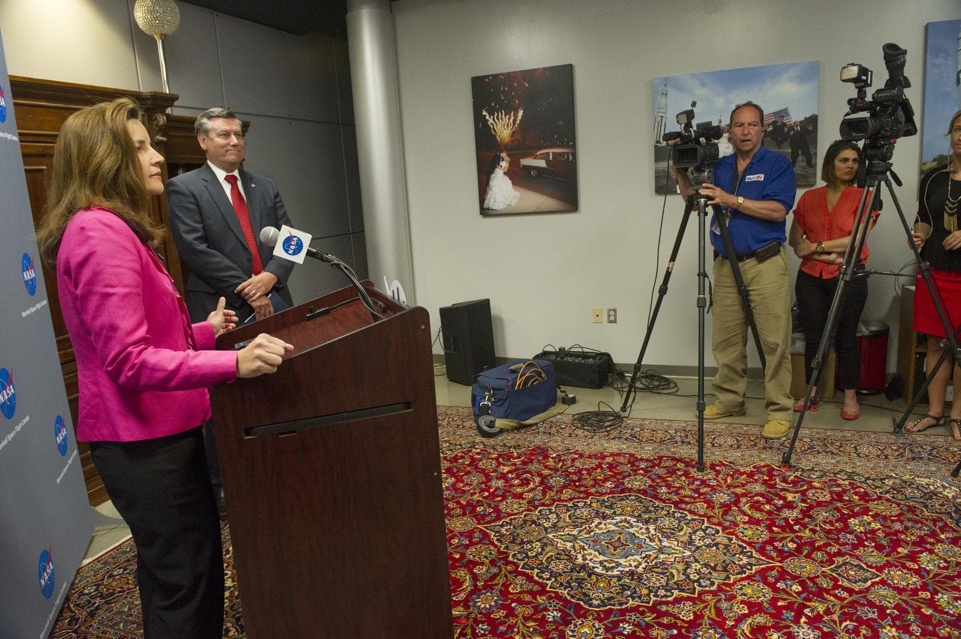 Marshall Center Director Patrick Scheuermann and Dr. Lisa Watson-Morgan talk to news media at the April 17 Marshall 2014 Update. Watson-Morgan, the first woman to be named the center's chief engineer,