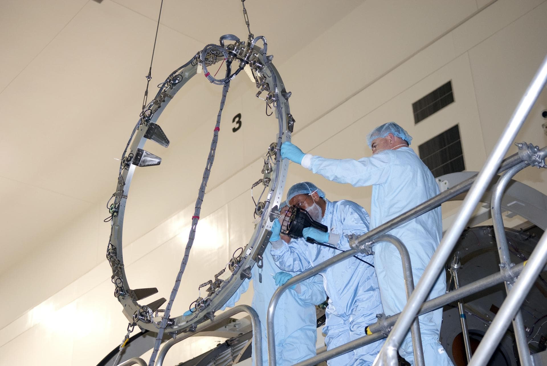 STS-133 COMMON BERTHING MECHANISIM (CMB) SIMULATOR HOIST & TEMPORARY INSTALL TO PERMANENT MULTIPURPOSE MODULE (PMM)