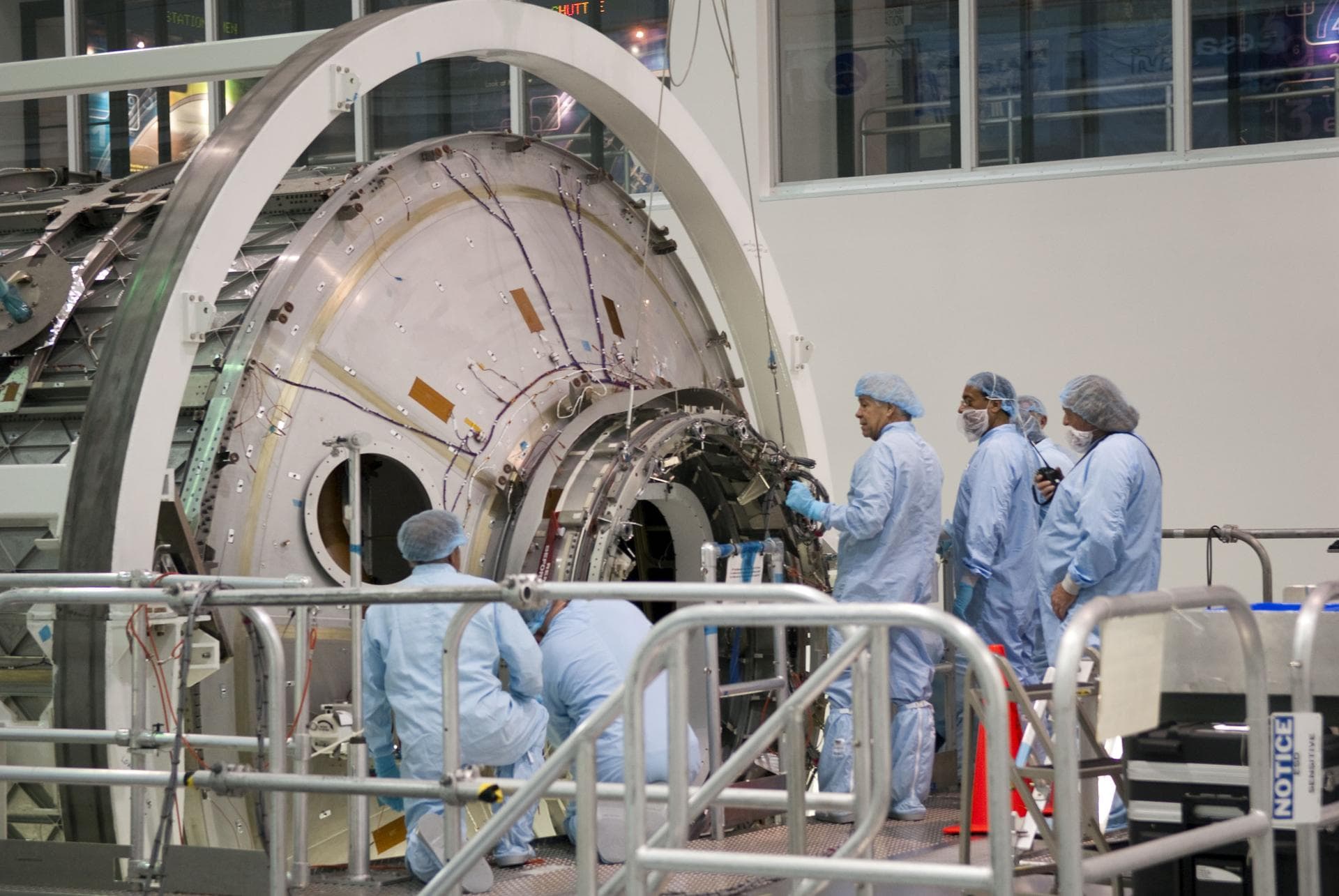 STS-133 COMMON BERTHING MECHANISIM (CMB) SIMULATOR HOIST & TEMPORARY INSTALL TO PERMANENT MULTIPURPOSE MODULE (PMM)