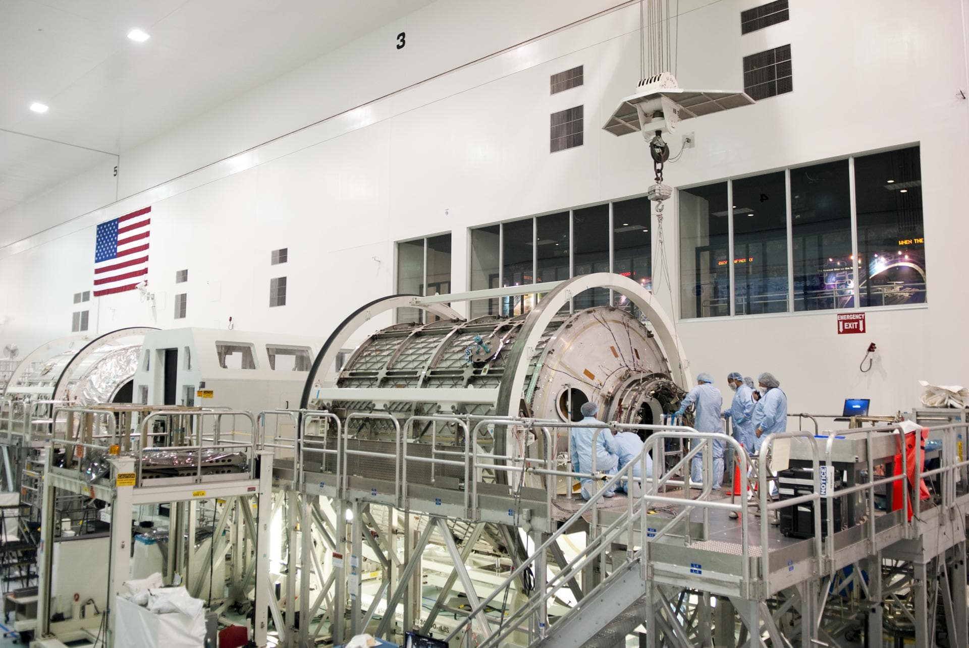 STS-133 COMMON BERTHING MECHANISIM (CMB) SIMULATOR HOIST & TEMPORARY INSTALL TO PERMANENT MULTIPURPOSE MODULE (PMM)