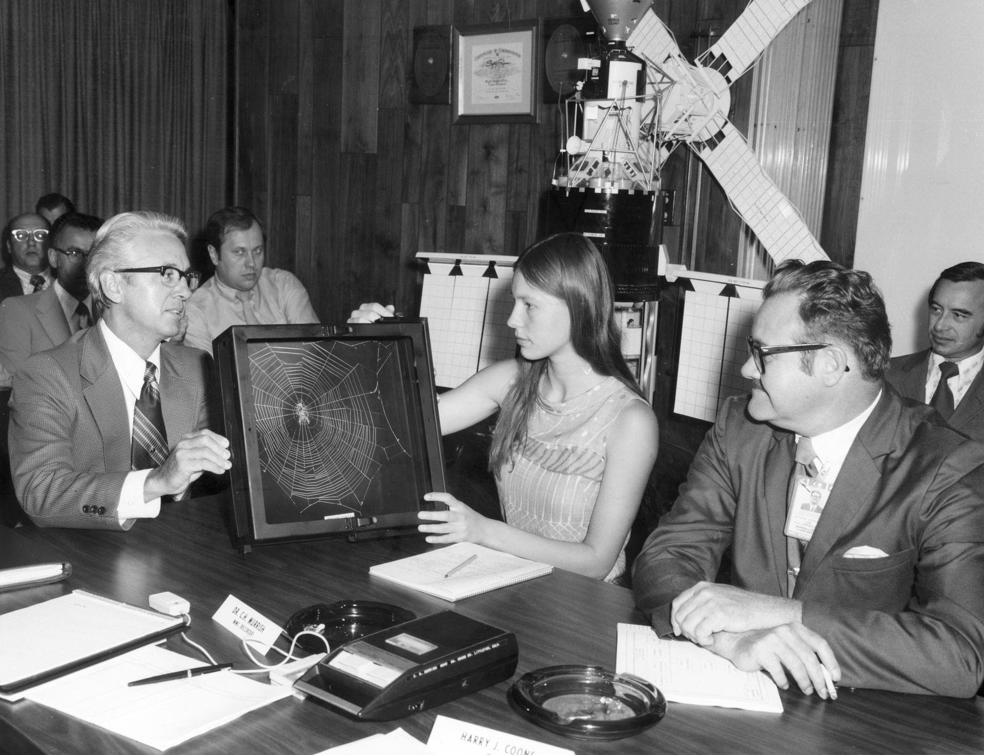 Lexington, Massachusetts high school student, Judith Miles, discusses her proposed Skylab experiment with Keith Demorest (right) and Henry Floyd, both of Marshall Space Flight Center (MSFC). In her ex