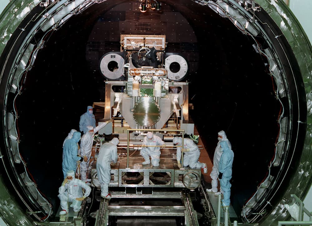 This photo shows the High Resolution Camera (HRC) for the Chandra X-Ray Observatory (CXO), formerly Advanced X-Ray Astrophysics Facility (AXAF), being integrated with the High Resolution Mirror Assemb
