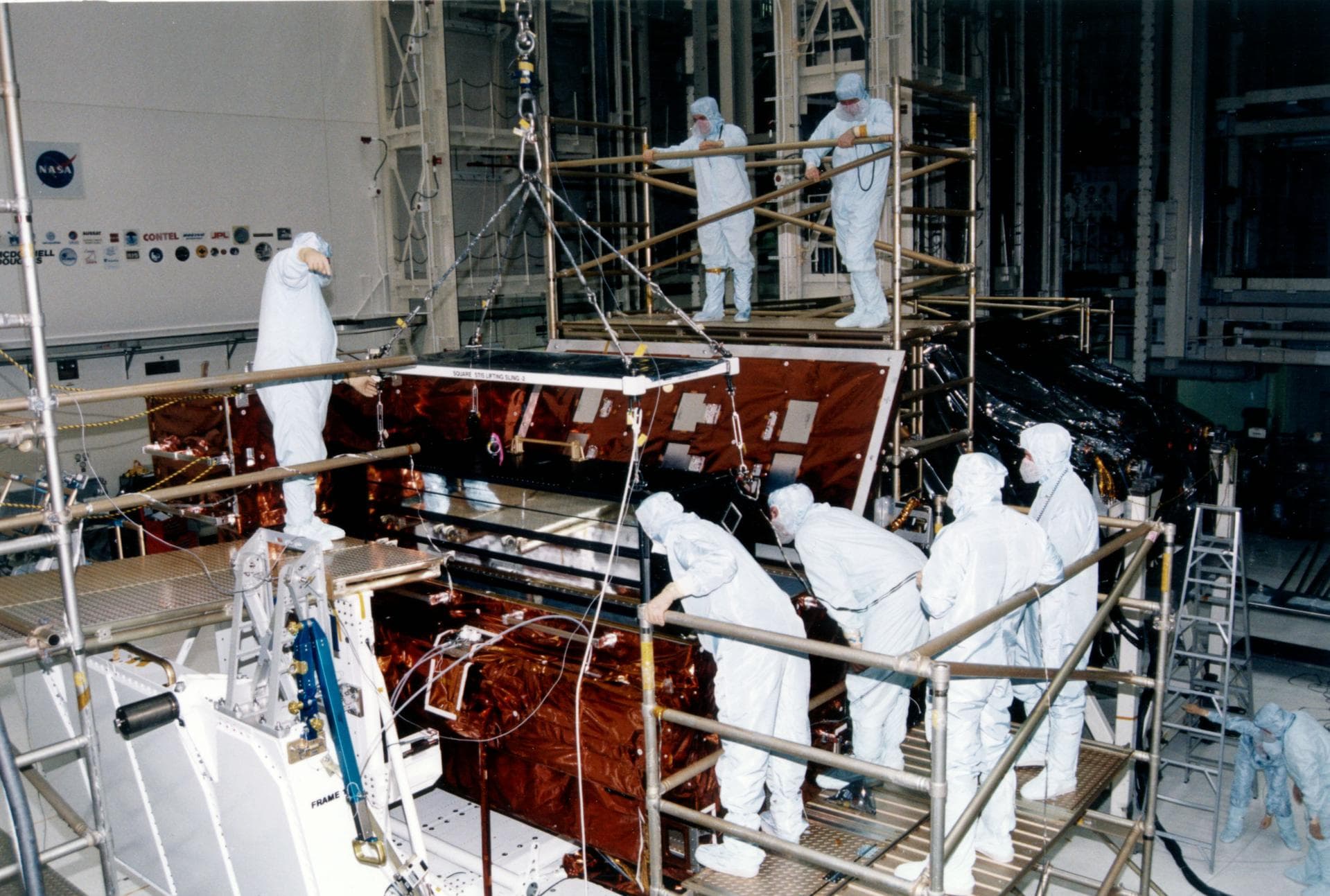 KENNEDY SPACE CENTER, FLORIDA  STS-82 PREPARATIONS VIEW --- Payload processing workers in the Kennedy Space Center (KSC) Vertical Processing Facility (VPF) prepare to integrate the Space Telescope Ima