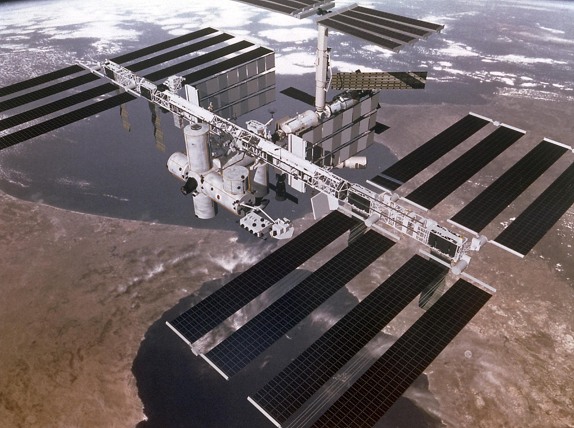 This artist's concept depicts the completely assembled International Space Station (ISS) passing over the Straits of Gibraltar and the Mediterranean Sea. As a gateway to permanent human presence in sp