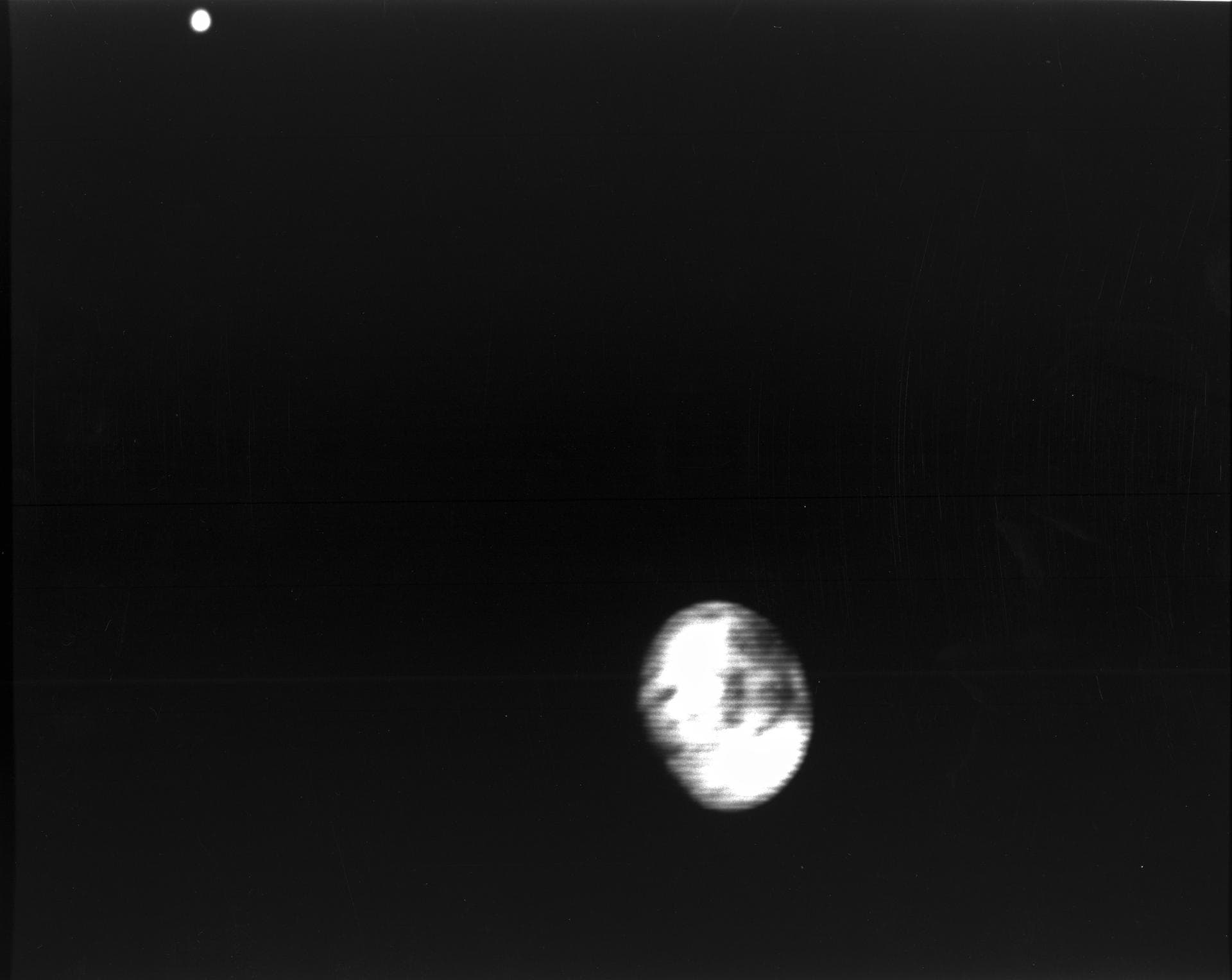Range : 5.9 million kilometers (3.66 million miles) Europa is Jupiter's 2nd Galilean satellites from the planet and the brightest.  Photo taken early morning through violet filter.  Faint swirls and l