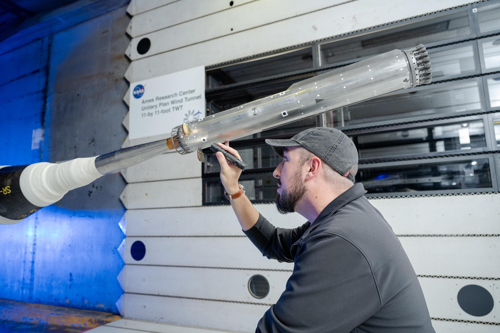 These photos show how engineers with conducted testing on a 1.2% scale model of SpaceX’s Super Heavy Version 3 rocket booster at NASA’s Ames Research Center in California’s Silicon Valley. The tests f