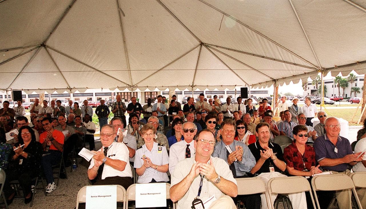The audience applauds and enjoys the official opening of the E&O Building as the new site of the Expendable Launch Vehicle Program. Home for NASA’s unmanned missions since 1964, the building has been 