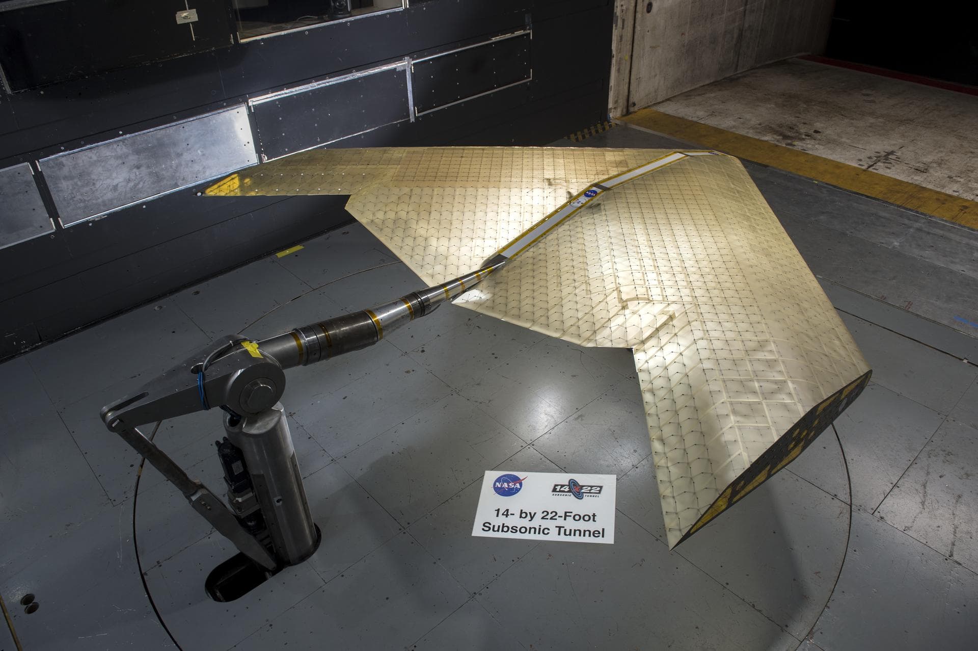 Mission Adaptive Digital Composite Aerostructure Technologies (MADCAT) model in the 14x22 test section, building 1212C For more information go to NASA.gov article. April 3, 2019 "What is MADCAT?" Flex