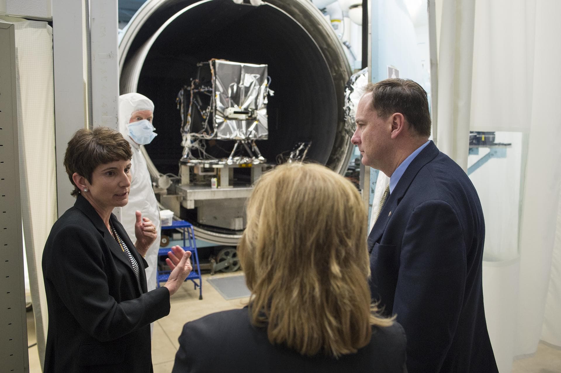 Leanne Presley, Operational Land Imager-2 (OLI-2) program manager at Ball Aerospace, left, speaks with acting NASA Deputy Administrator Lesa Roe, center, and acting NASA Administrator Robert Lightfoot