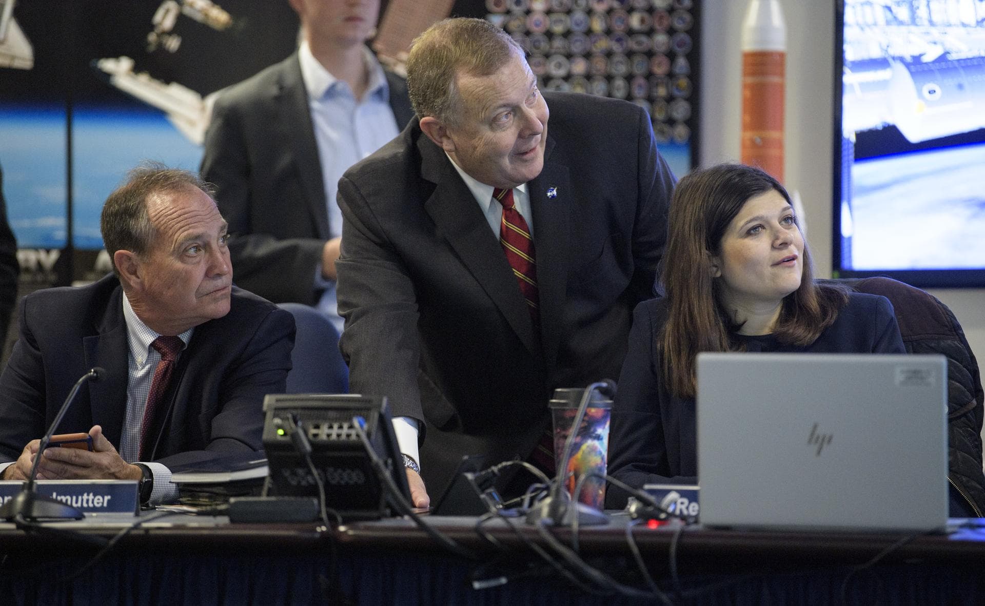 NASA Deputy Administrator Jim Morhard, center, is seen with Rep. Ed Perlmutter, D-Col., left, and Rep. Haley Stevens, D-Mich., as they watch the beginning of the first all-woman spacewalk on Friday, O