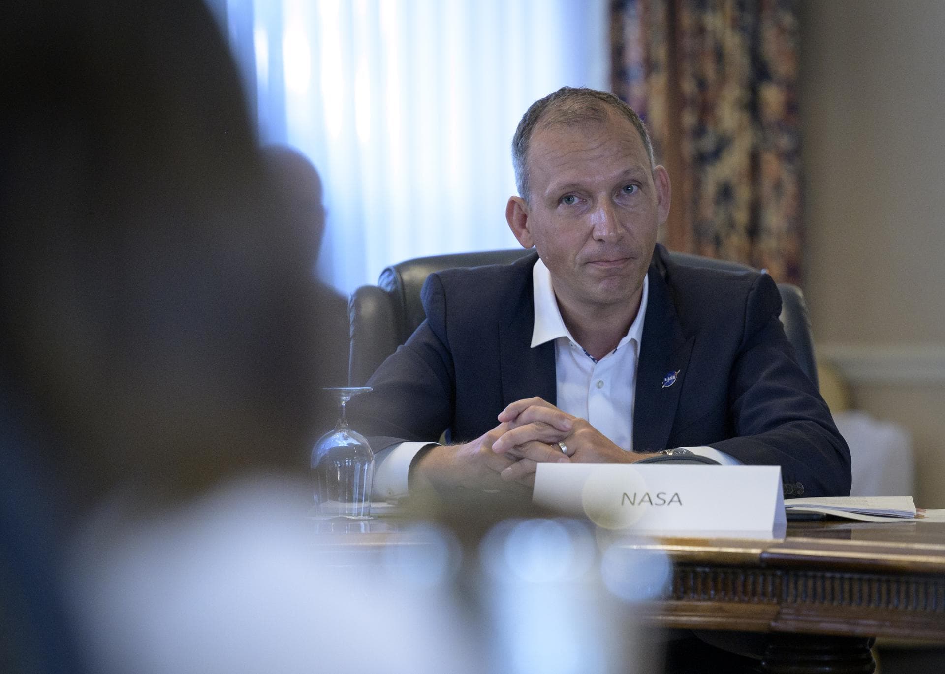 NASA Associate Administrator for Science Thomas Zurbuchen listens to Lisa Campbell, President, Canadian Space Agency (CSA) in a bilateral meeting during the 36th 36th Space Symposium, Monday, Aug. 23,