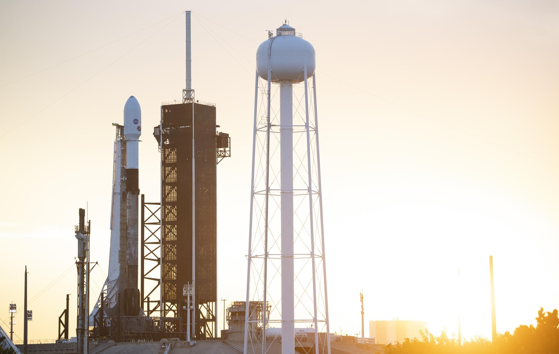 A SpaceX Falcon 9 rocket carrying NASA’s Imaging X-ray Polarimetry Explorer (IXPE) spacecraft is seen on the launch pad at Launch Complex 39A, Wednesday, Dec. 8, 2021, at NASA’s Kennedy Space Center i