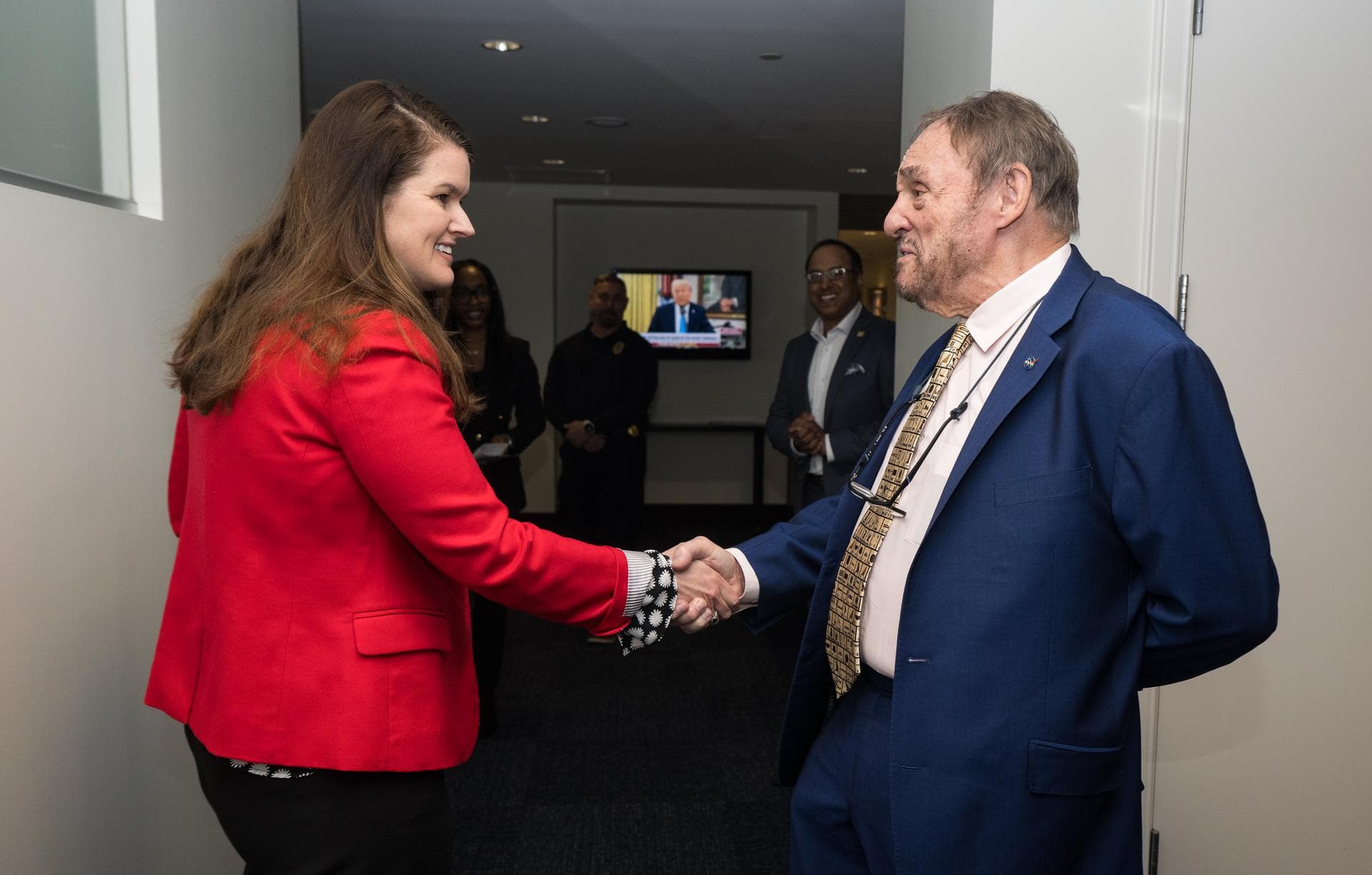 Casey Swails, NASA Deputy Associate Administrator greets John Rhys-Davies, the actor best known for his roles as Gimli in The Lord of the Rings trilogy and Sallah in the Indiana Jones franchise, Frida