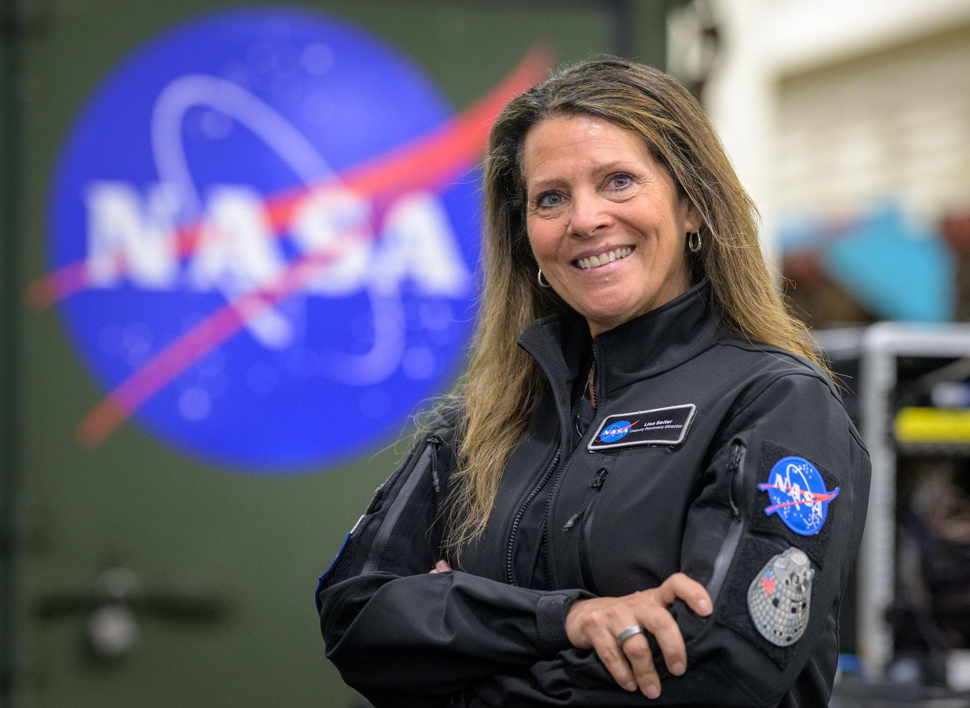 Lisa Seiler, Artemis Landing and Recovery Deputy Director, poses for a portrait onboard USS John P. Murtha, Thursday, April 9, 2026, in the Pacific Ocean off the coast of California.  Photo Credit: (N