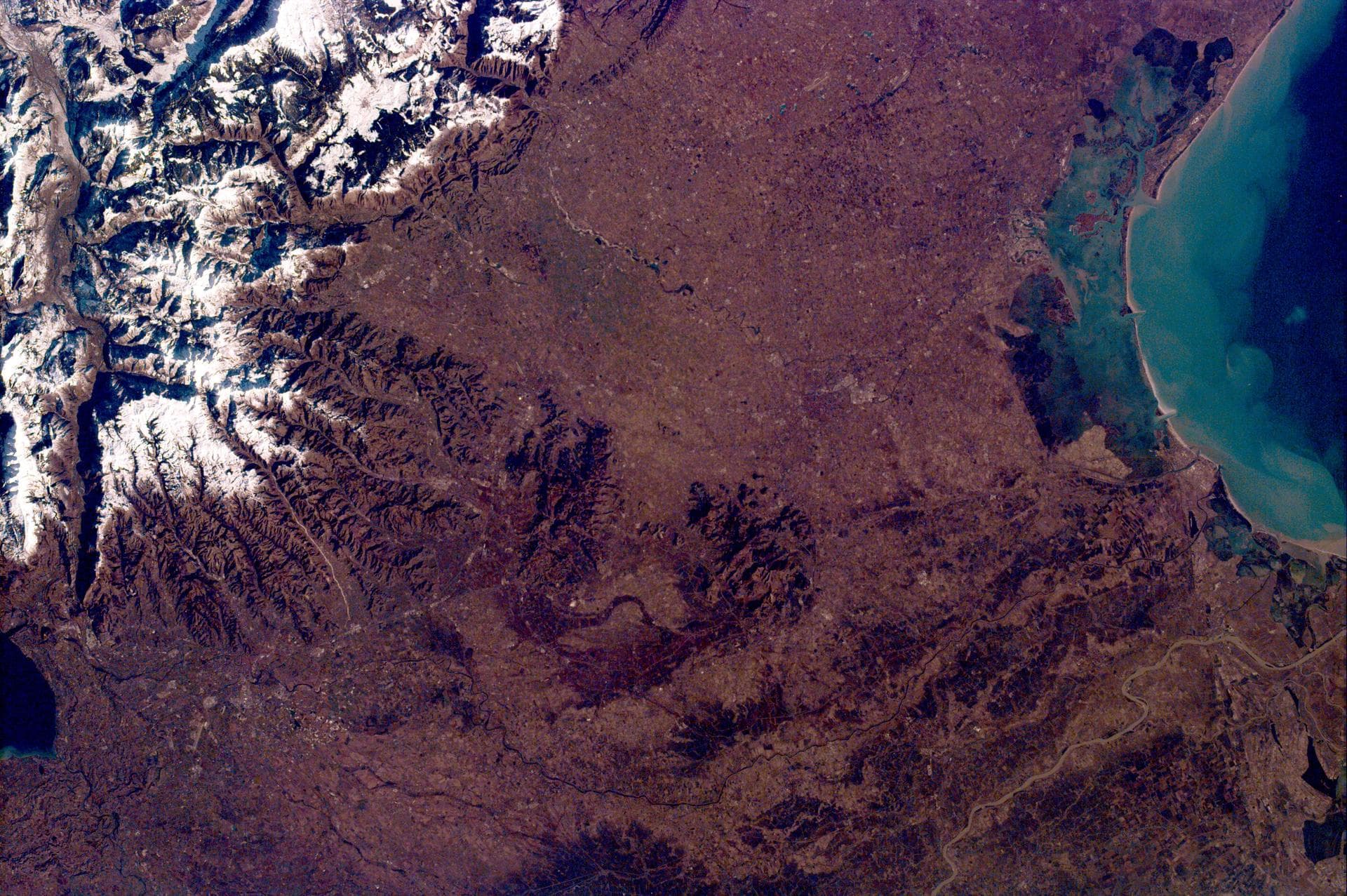 This image from NASA KidSat spans the region of Venetia from the city of Venice, Italy, on the coast of the Adriatic Sea north to the snow-capped Alps. Venice appears in the lower left part of the ima