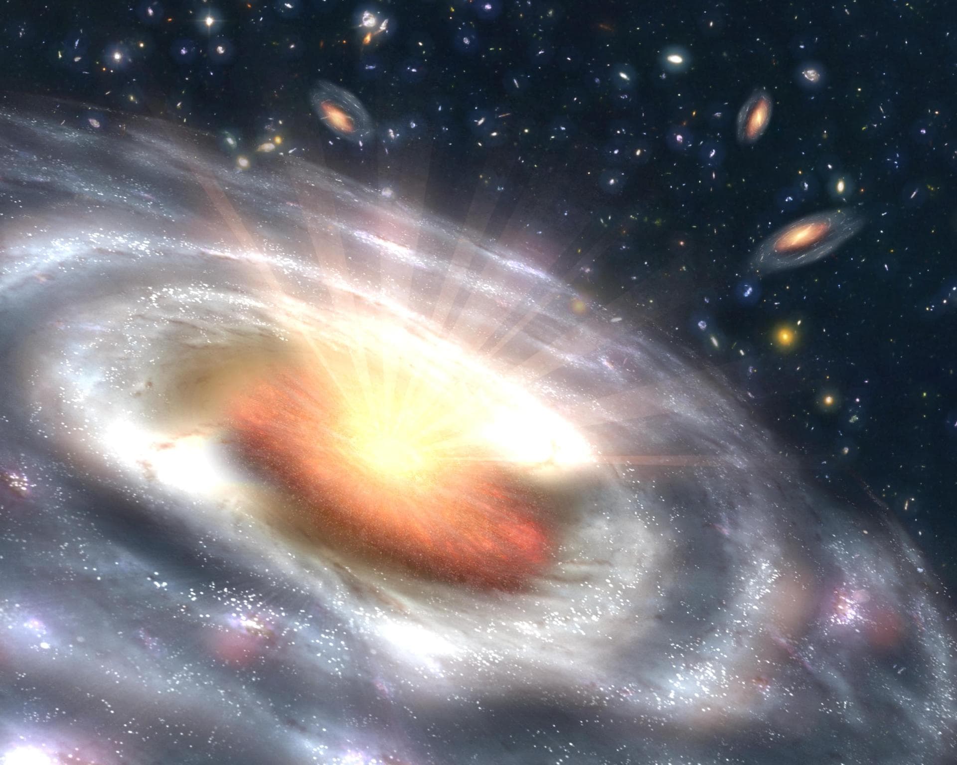 A growing black hole, called a quasar, is seen at the center of a faraway galaxy in this artist concept. Astronomers using NASA Spitzer and Chandra space telescopes discovered swarms of similar quasar