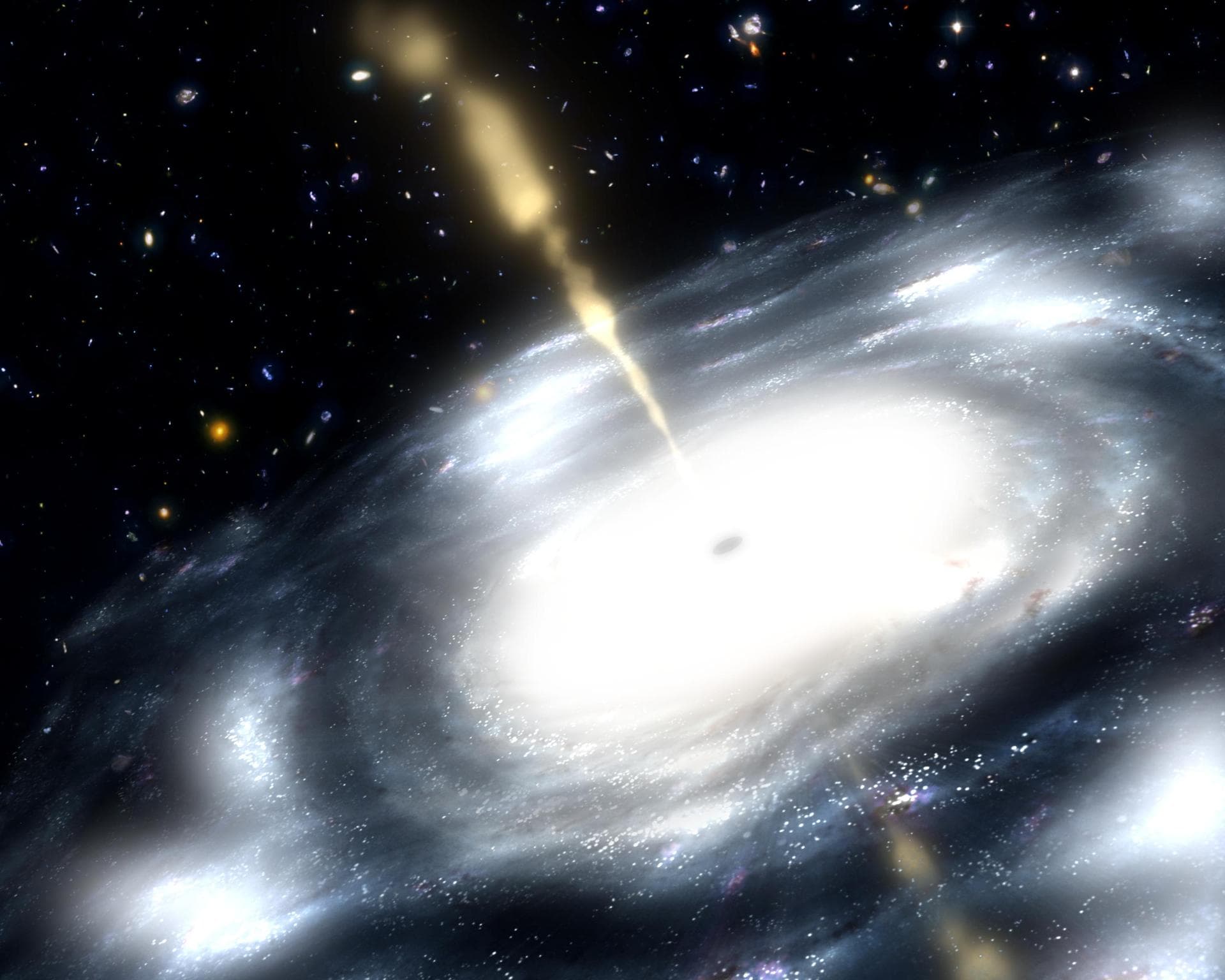 This artist concept shows a galaxy with a supermassive black hole at its core. The black hole is shooting out jets of radio waves.