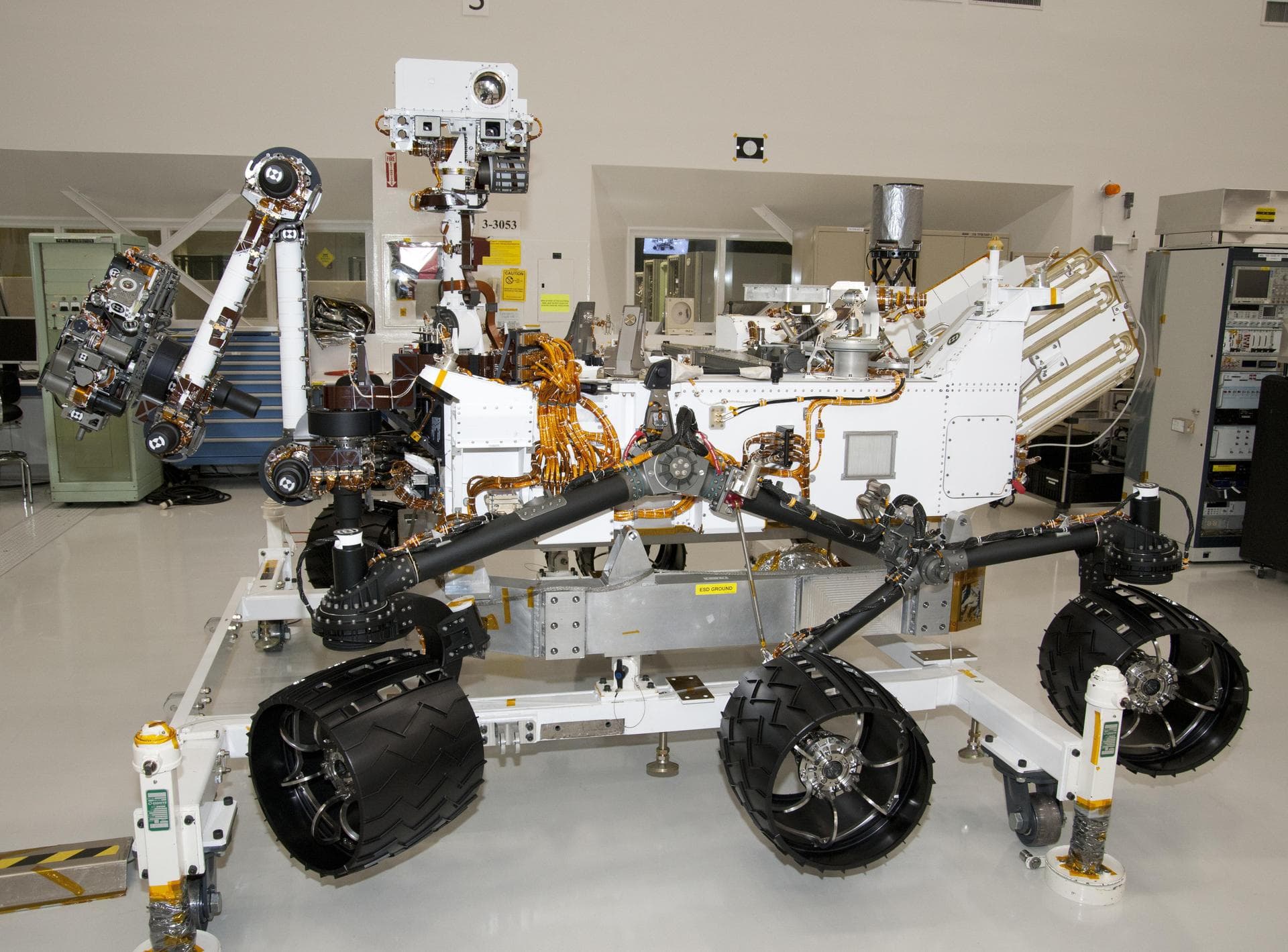The rover for NASA Mars Science Laboratory mission, named Curiosity, is about 3 meters 10 feet long, not counting the additional length that the rover arm can be extended forward. The front of the rov