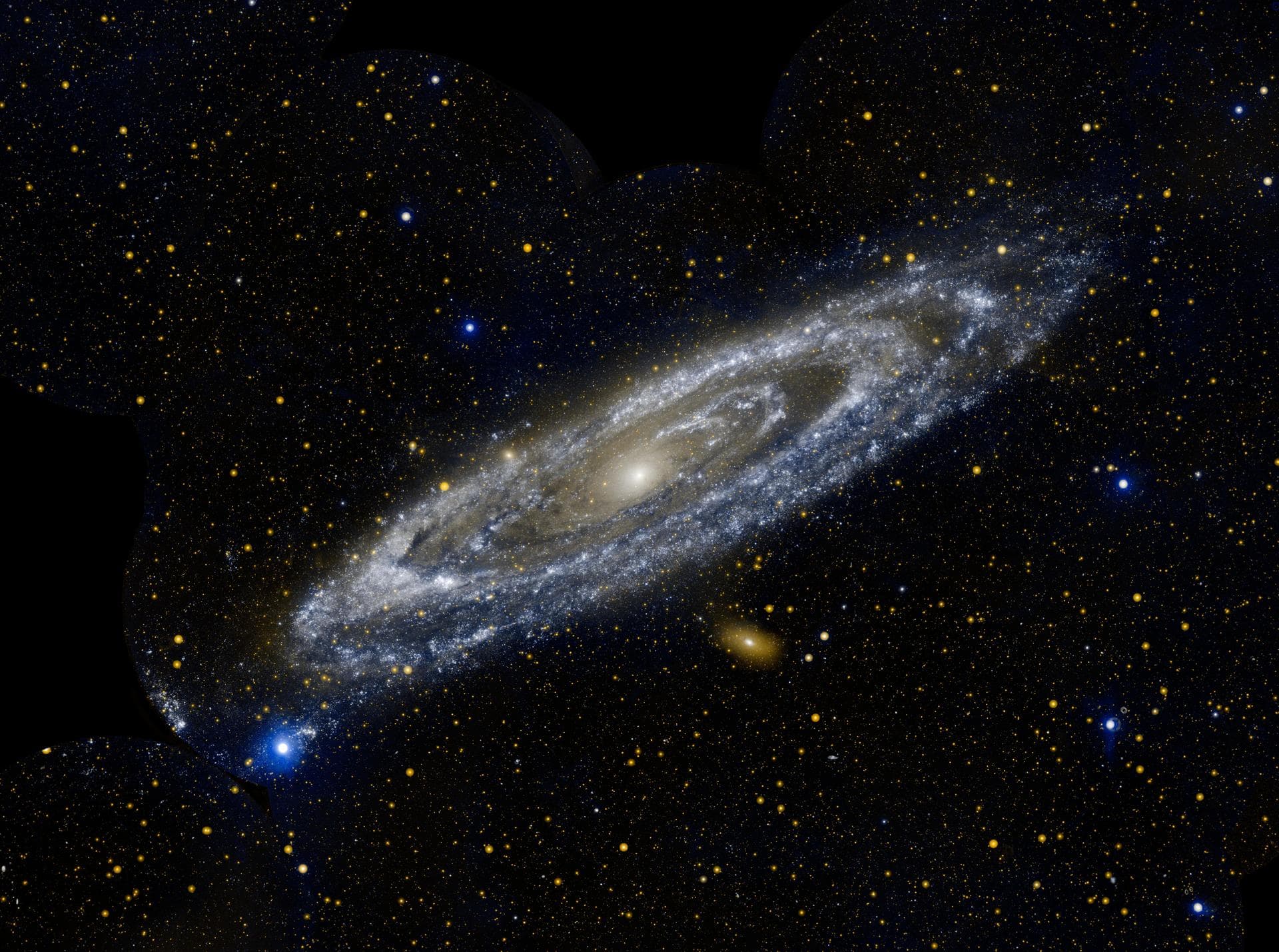 Hot stars burn brightly in this new image from NASA Galaxy Evolution Explorer, showing the ultraviolet side of a familiar face. Approximately 2.5 million light-years away, the Andromeda galaxy, or M31