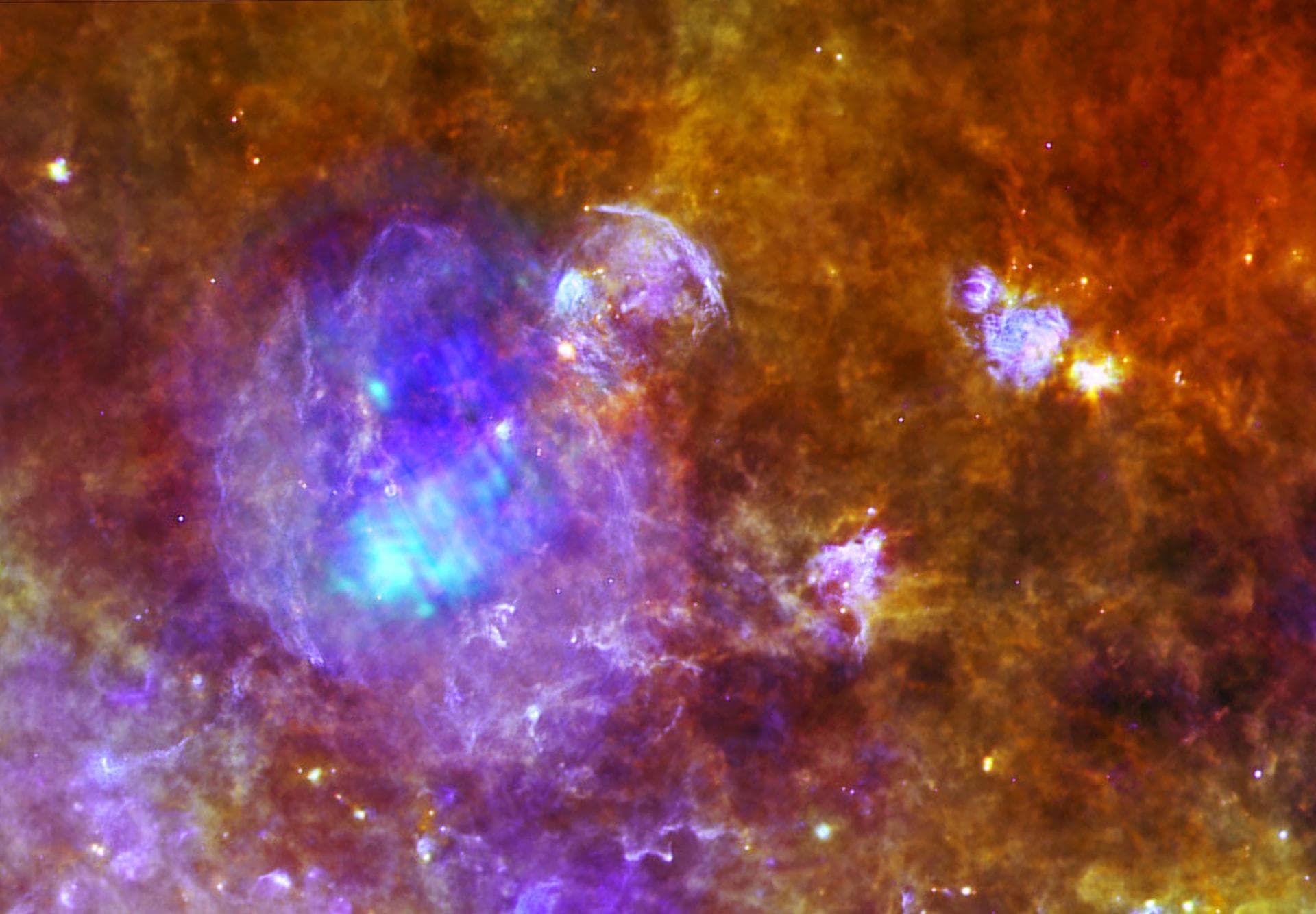 W44 is located around 10,000 light-years away, within a forest of dense star-forming clouds in the constellation of Aquila, the Eagle. This image combines data from ESA Herschel and XXM-Newton space o