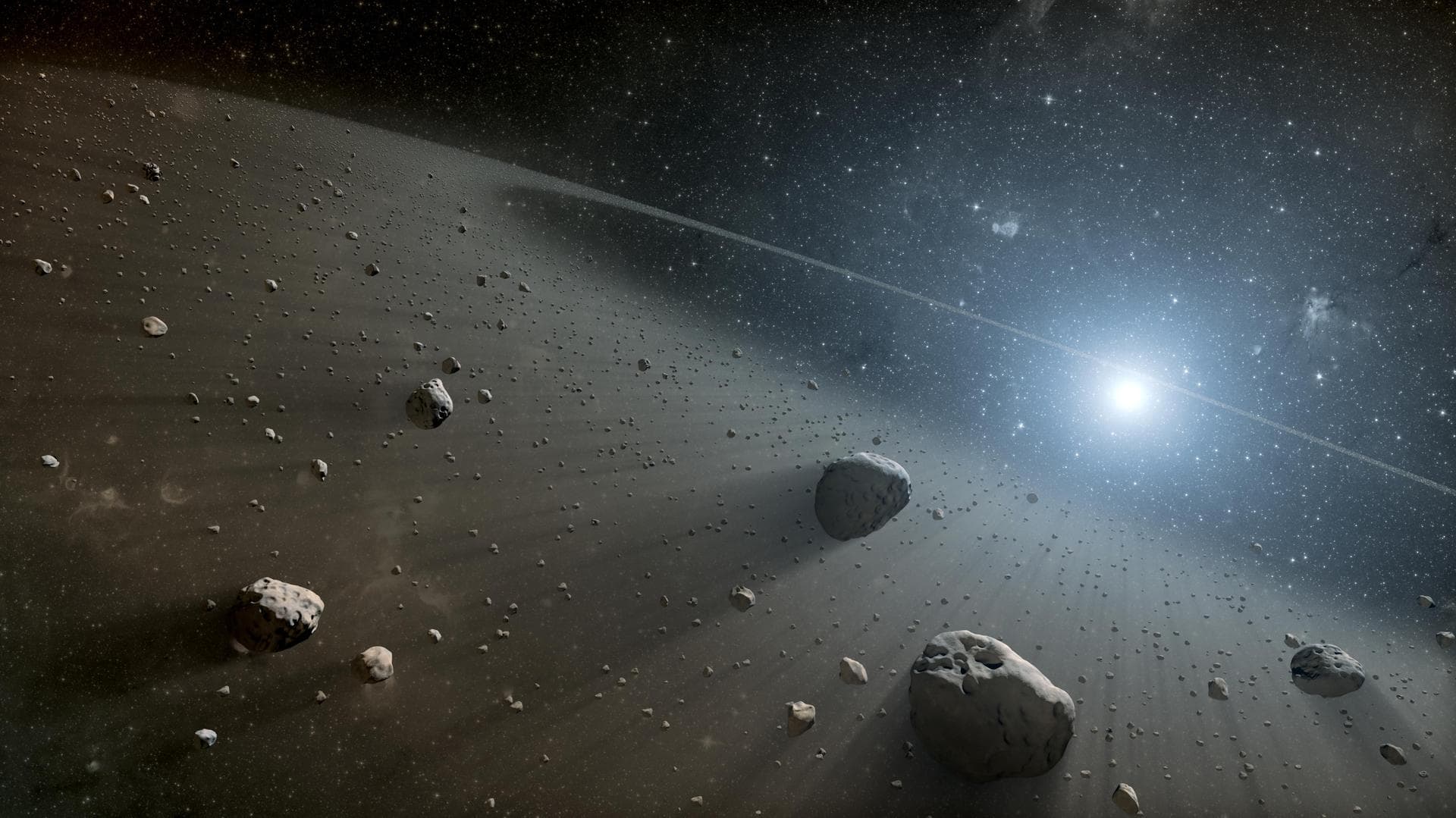 This artist concept illustrates an asteroid belt around the bright star Vega. Evidence for this warm ring of debris was found using NASA Spitzer Space Telescope, and the European Space Agency Herschel