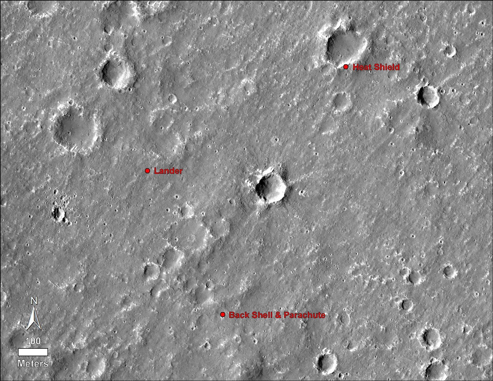 An annotated image of the surface of Mars, taken by the HiRISE camera on NASA's Mars Reconnaissance Orbiter (MRO) on May 30, 2014. The annotations - added after InSight landed on Nov. 26, 2018 - displ