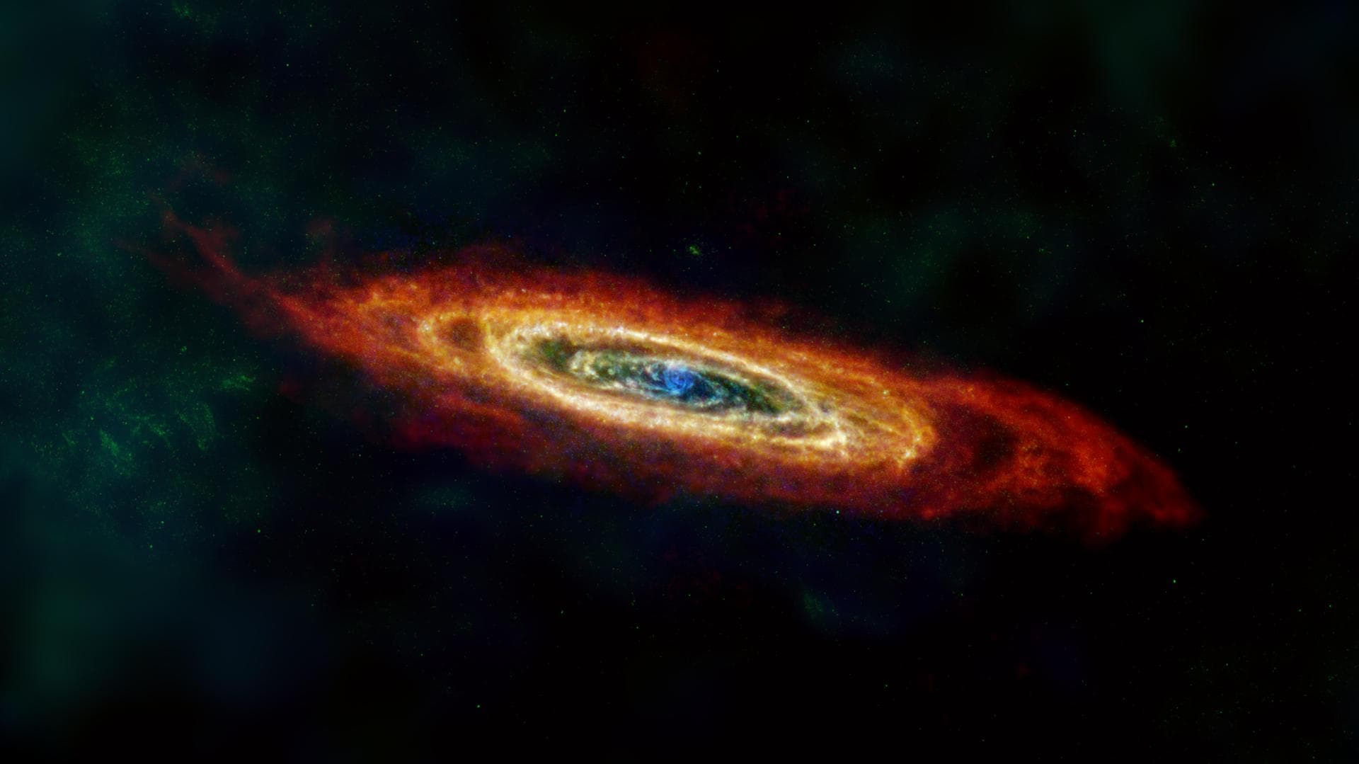 This image of the Andromeda galaxy, or M31, includes data from the ESA (European Space Agency) Herschel mission, supplemented with data from ESA's retired Planck observatory and two retired NASA missi