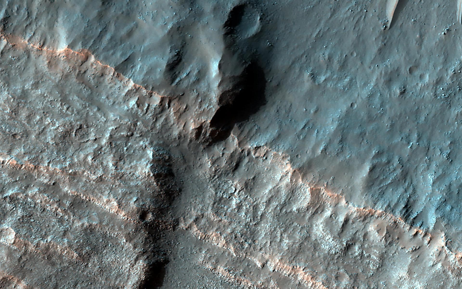 Many craters in the mid-latitudes of Mars are partially filled with deposits that have been interpreted to be ice-rich. We expect the deposits to have formed at an earlier (but relatively recent) time