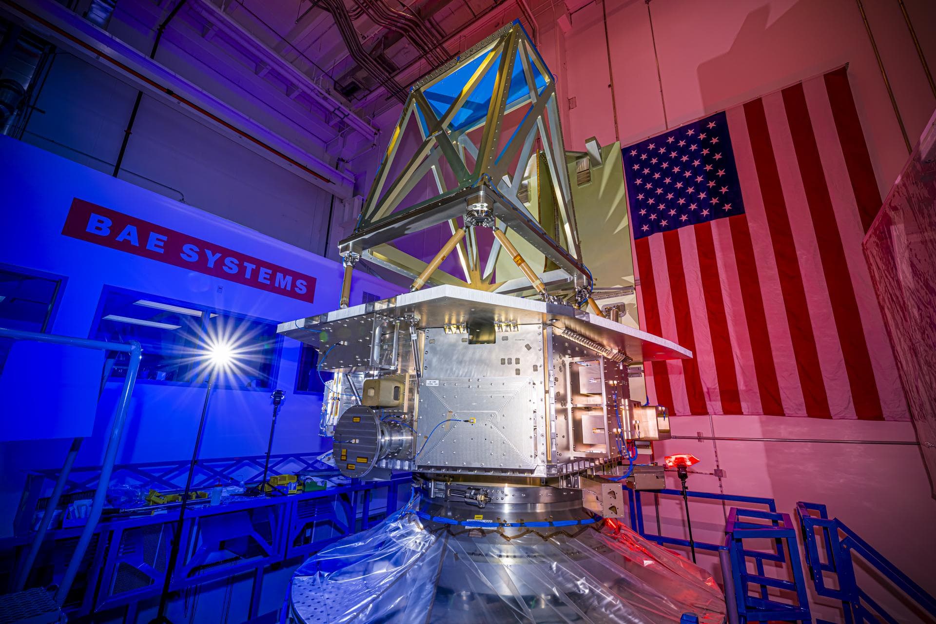 The bus structure for NASA’s Near-Earth Object (NEO) Surveyor is installed on a “shaker table” at BAE Systems Space & Mission Systems in Boulder, Colorado, during vibration testing conducted in August