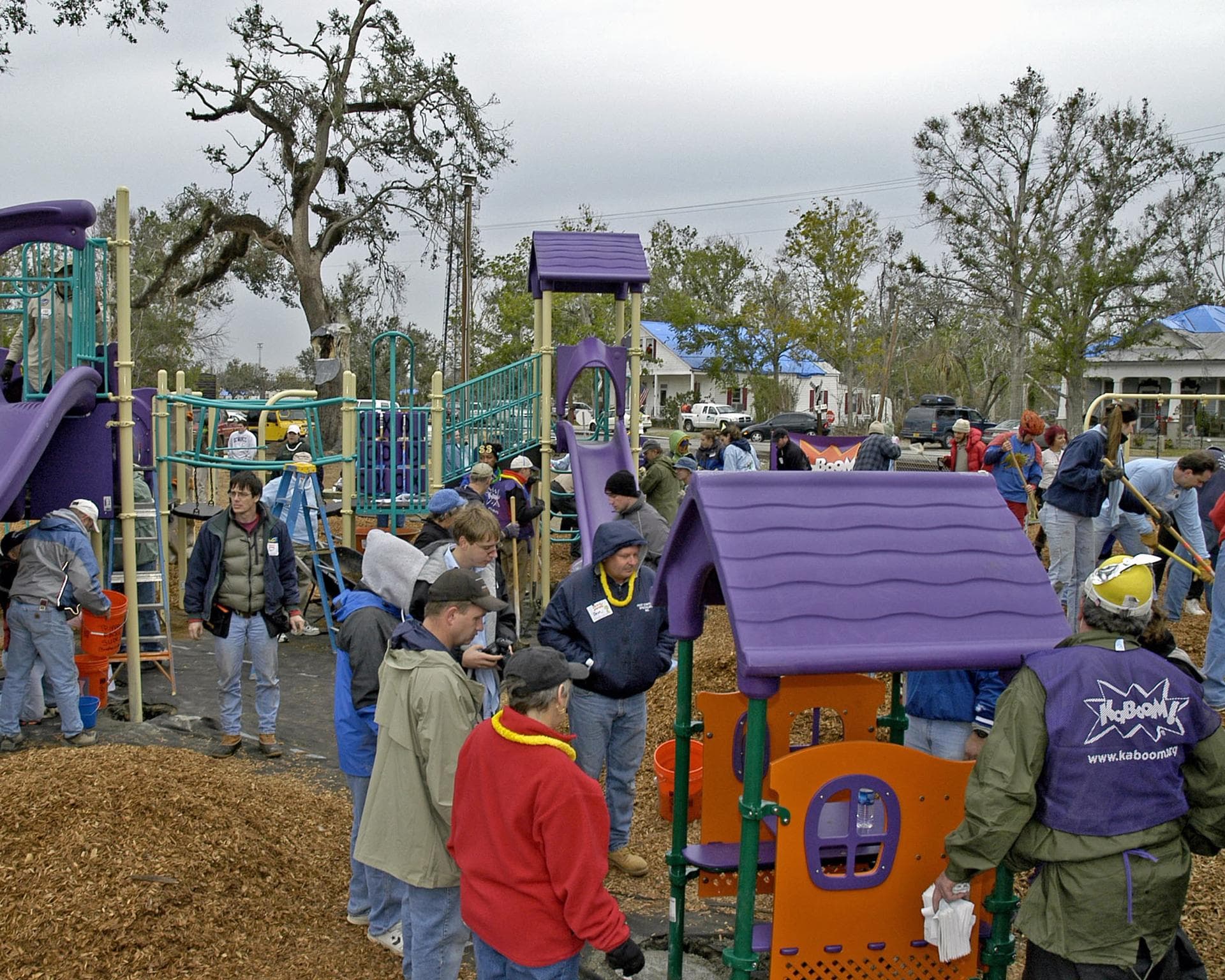 More than 650 volunteers - many of them employees at NASA's Stennis Space Center - weathered rain and cold to transform Bay St. Louis' old City Park into a playground Dec. 17. Volunteers assembled and