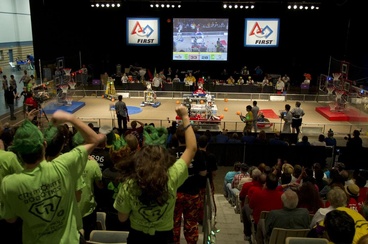 Spectators crew on teams during the 2012 FIRST (For Inspiration and Recognition of Science and Technology) Robotics Bayou Regional Competition March 15-17, 2012, in Kenner, La. Students from 49 high s