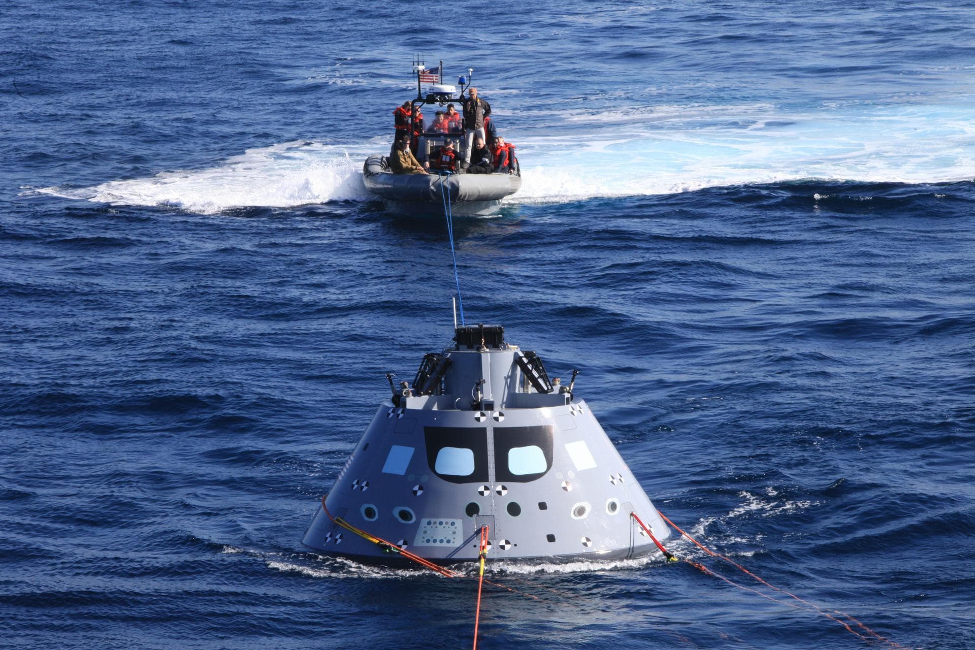 As part of Underway Recovery Test 6 on Jan. 18, 2018, the Orion test article is pulled in by a winch line at the rear of the USS Anchorage’s well deck that brings the capsule into the ship, along with