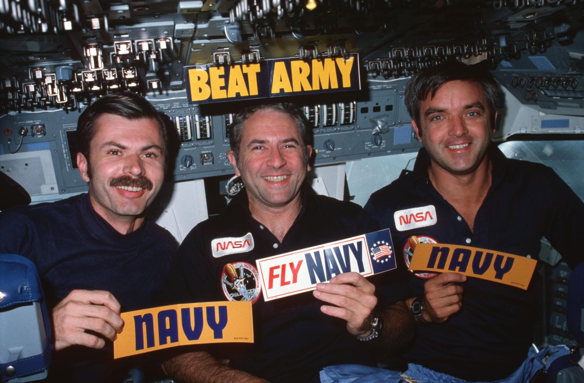 STS008-16-454 (30 Aug-5 Sept 1983) --- Following a precedent set early two decades ago during the Gemini program, three members of the STS-8 astronaut crew aboard the Earth-orbiting Space Shuttle Cha