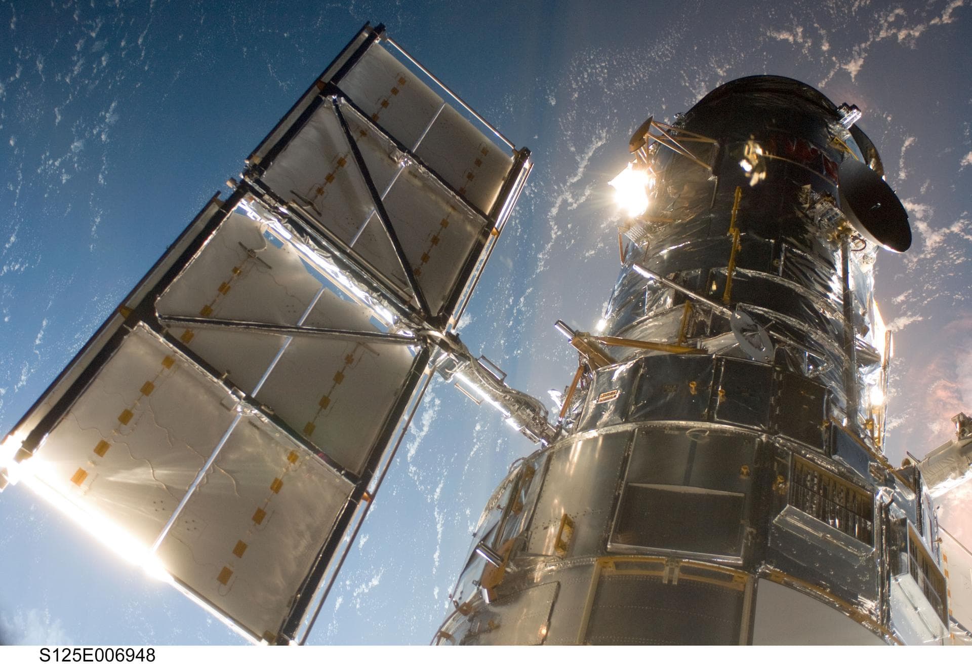 S125e006948 (13 May 2009) ---  An STS-125 crewmember onboard the Space Shuttle Atlantis snapped a still photo of the Hubble Space Telescope following grapple of the giant observatory by the shuttle?s 