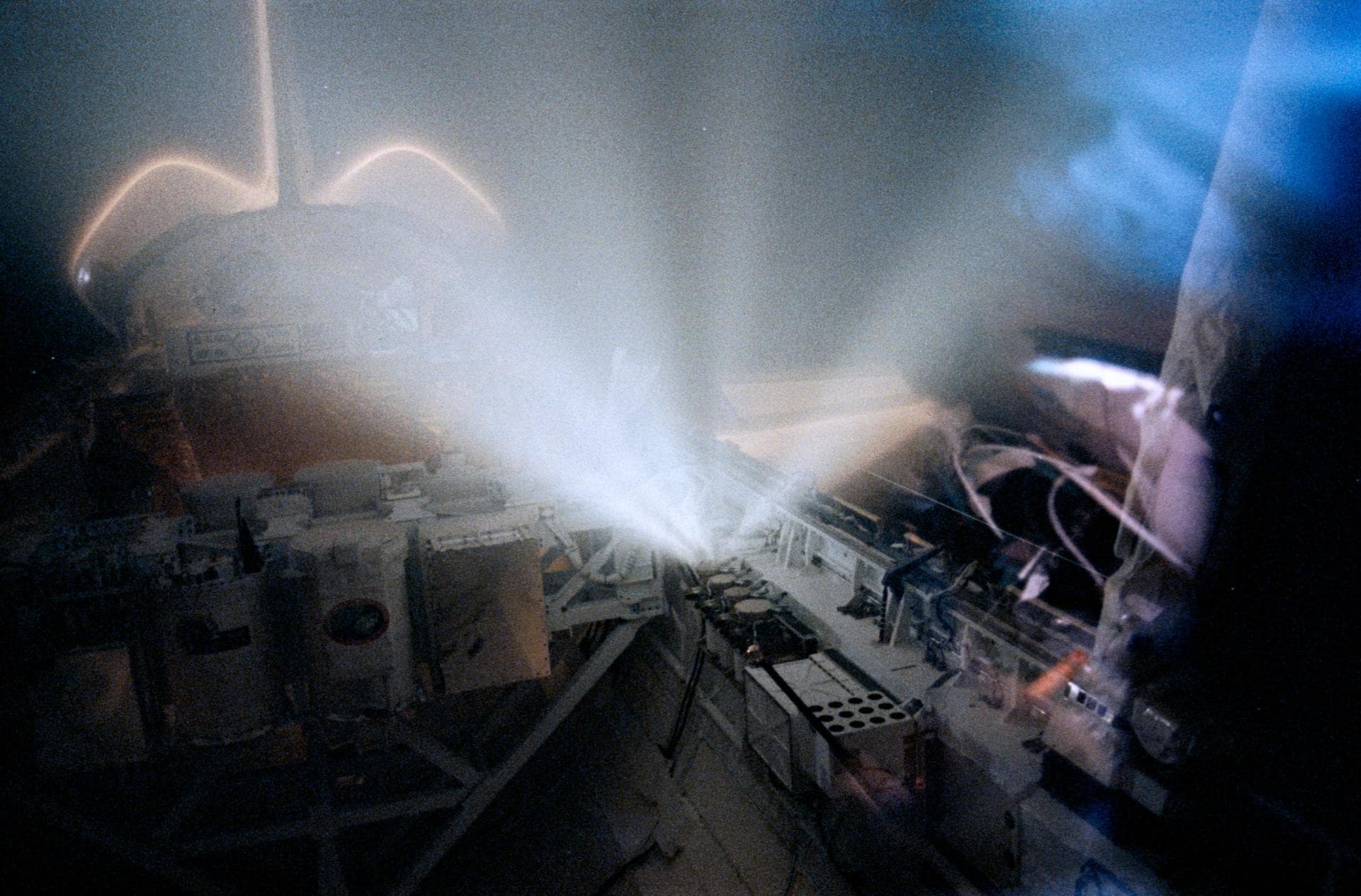 STS039-367-006 (1 May 1991) --- One of the four compressed gas canisters on the forward port side of Discovery's cargo bay releases gas on flight day 4 of the STS-39 mission.  The canisters are part o