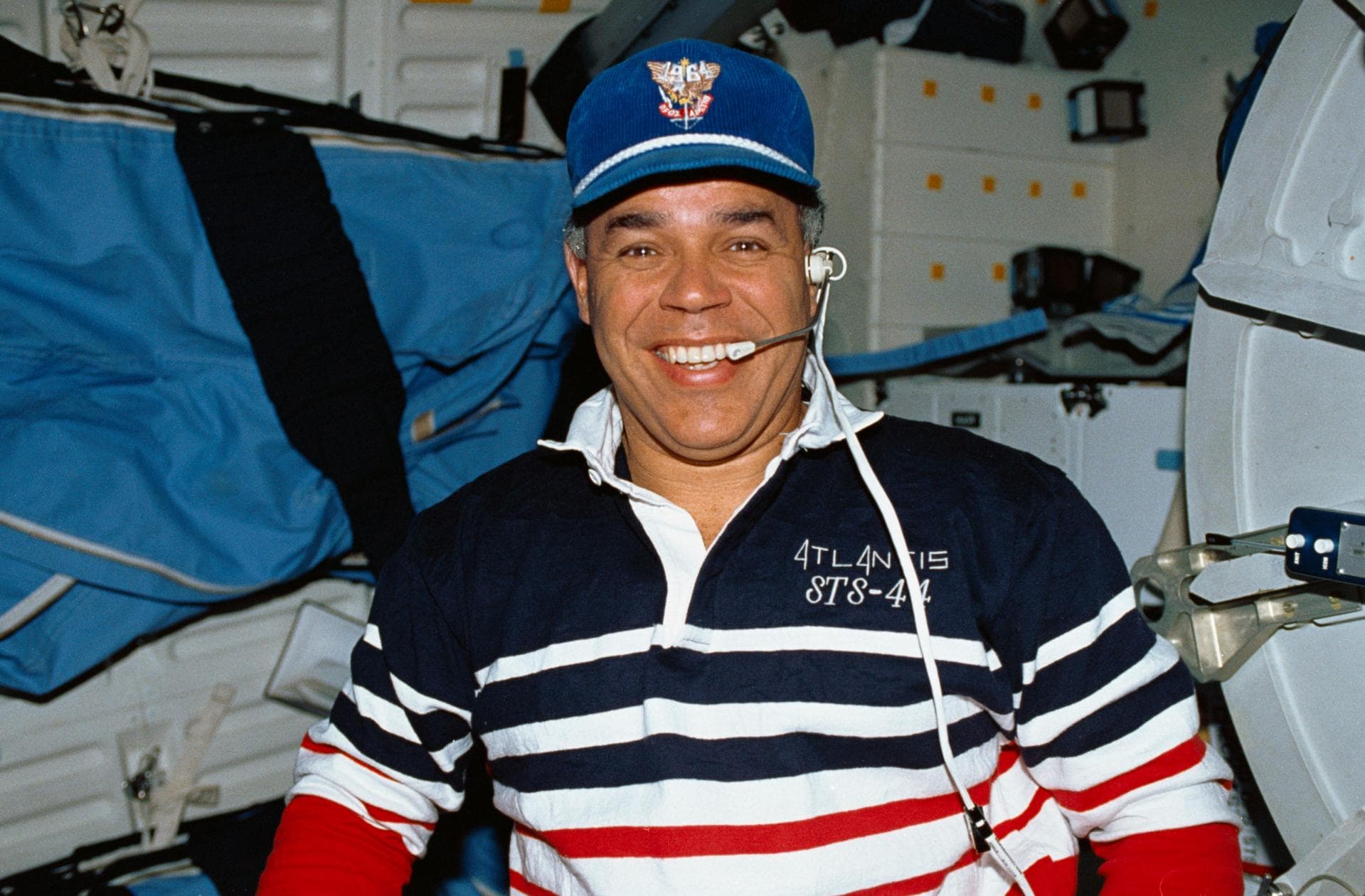 STS044-32-030 (24 Nov-1 Dec 1991) --- STS-44 Commander Frederick D. Gregory wears a cap honoring his alma mater, the United States Air Force (USAF) Academy, on the middeck of Atlantis, Orbiter Vehicle