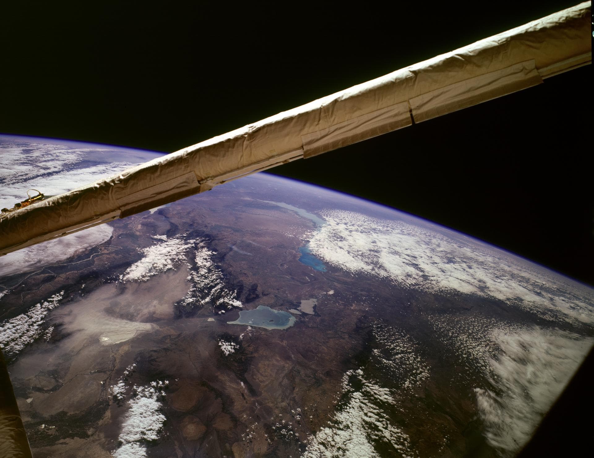 STS085-503-061 (7 - 19 August 1997) --- Lakes Balkhash and Alakol, southern uplands of Kazakhstan, central Asia.  The long, 600 kilometers arc of Lake Balkhash occupies the center of this clear west-l