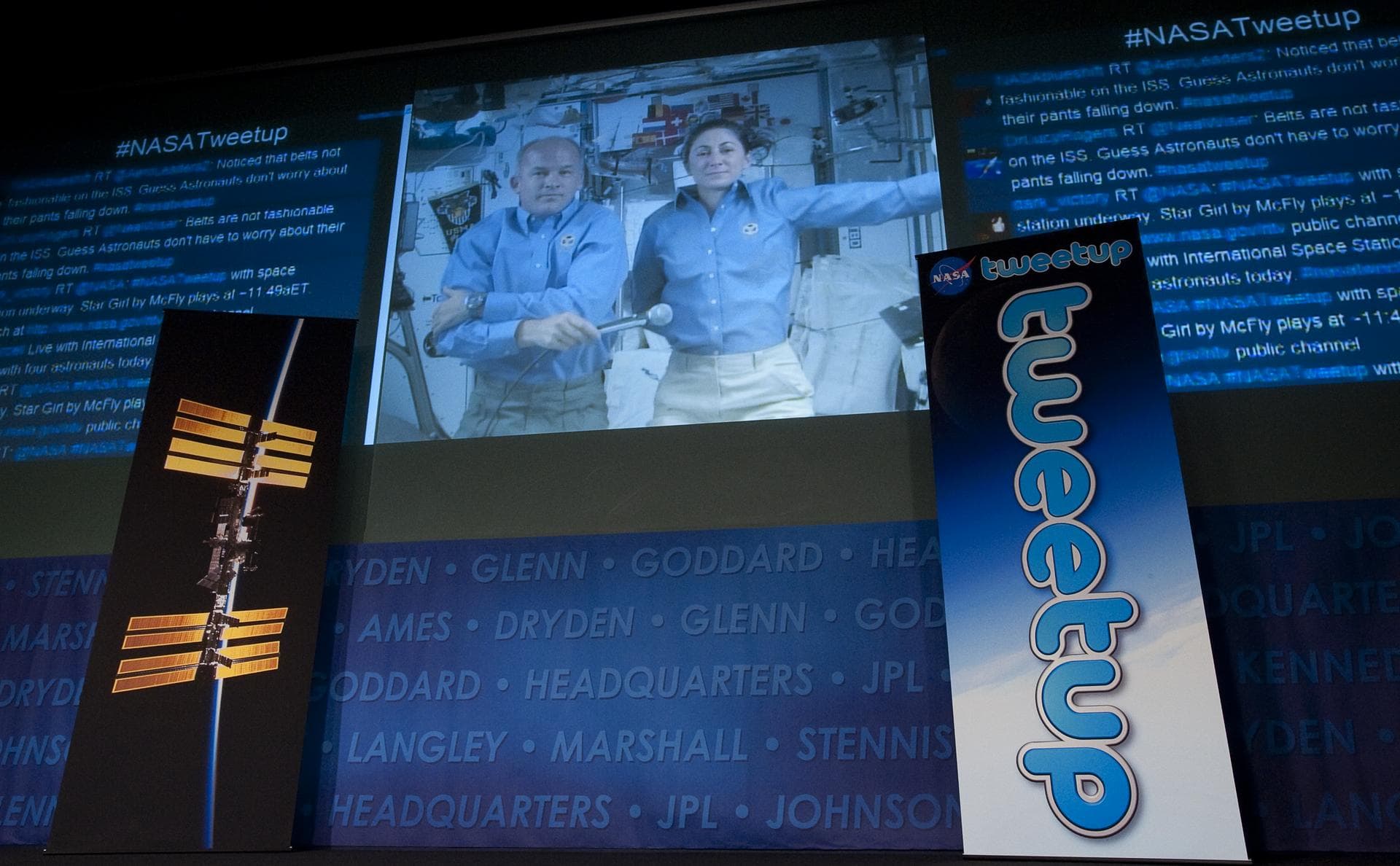 Expedition 20 Flight Engineers Jeff Williams, left, and Nicole Stott are seen during a live broadcast from the International Space Station (ISS) as they answer questions from NASA Twitter followers at