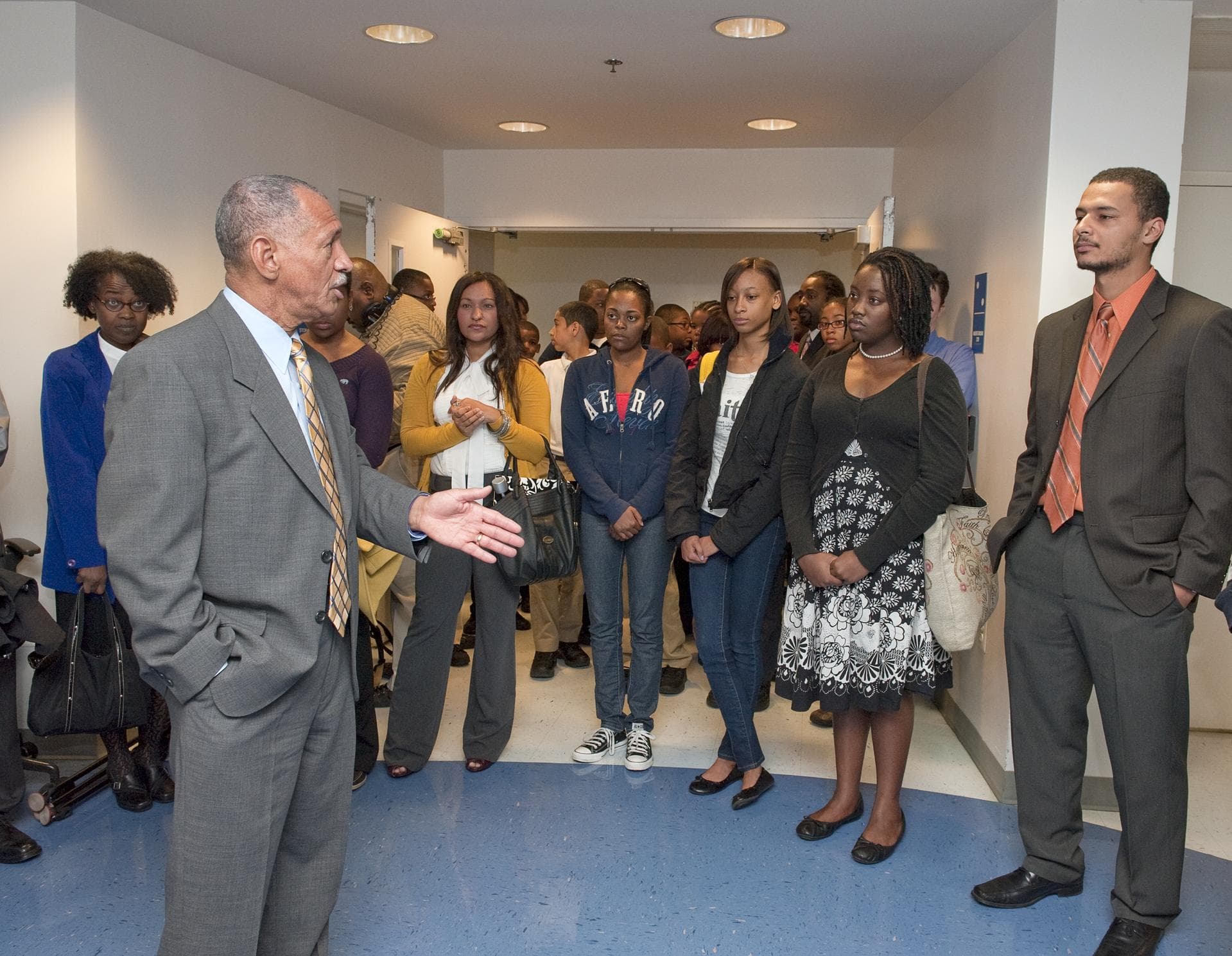 NASA Administrator Charles Bolden, foreground, speaks with Howard University students after he and and U.S. Environmental Protection Agency (EPA) Administrator Lisa P. Jackson, right, signed a Memora