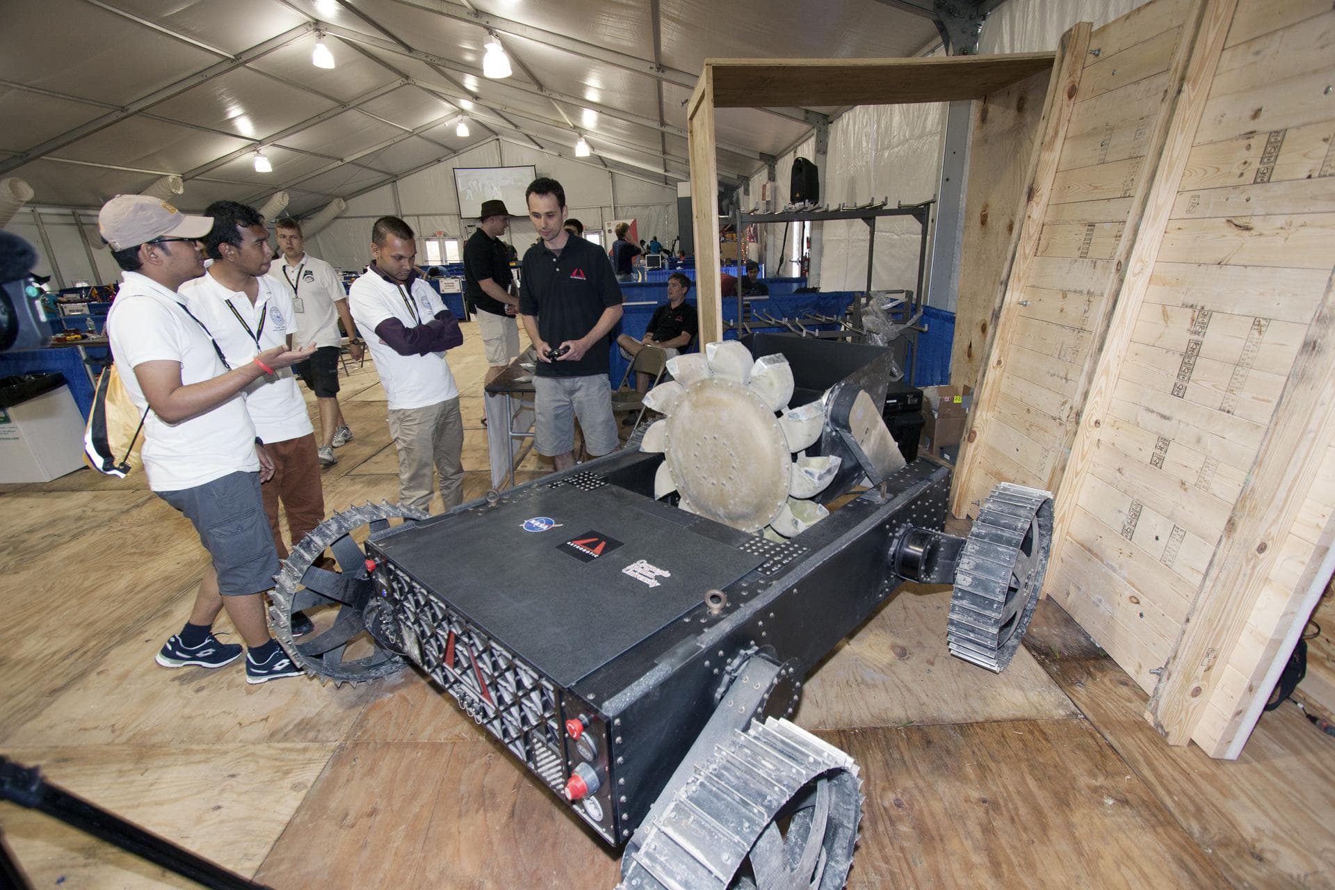 CAPE CANAVERAL, Fla. – A team from Astrobotic Technology, Inc., demonstrates the Polaris rover at a robotics mining competition at NASA's Kennedy Space Center. Astrobotic developed the Polaris to pros