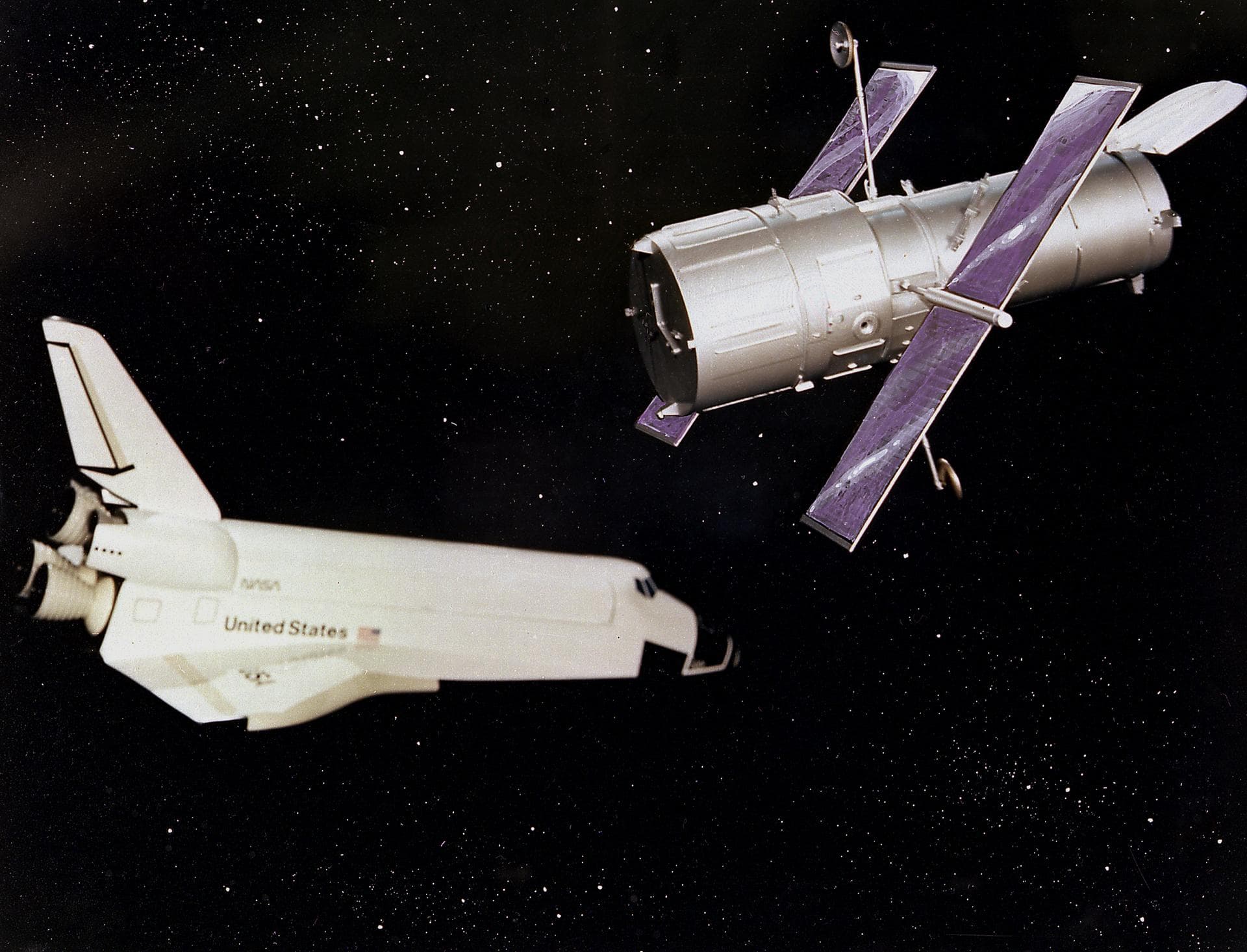 This artist's concept depicts the Hubble Space Telescope after being released into orbit, with the high gain anternas and solar arrays deployed and the aperture doors opened. The HST is the product of