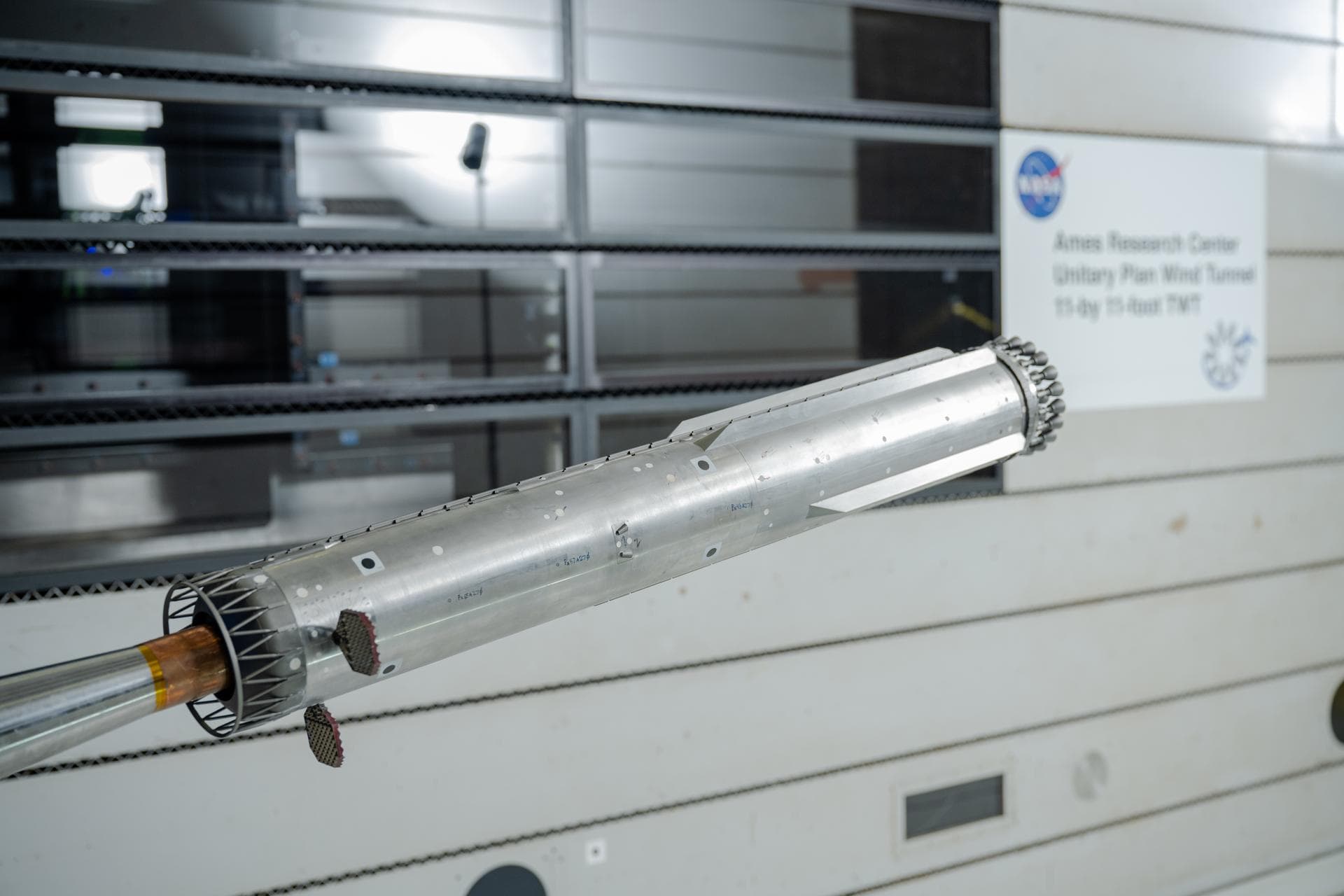 These photos show how engineers with conducted testing on a 1.2% scale model of SpaceX’s Super Heavy Version 3 rocket booster at NASA’s Ames Research Center in California’s Silicon Valley. The tests f