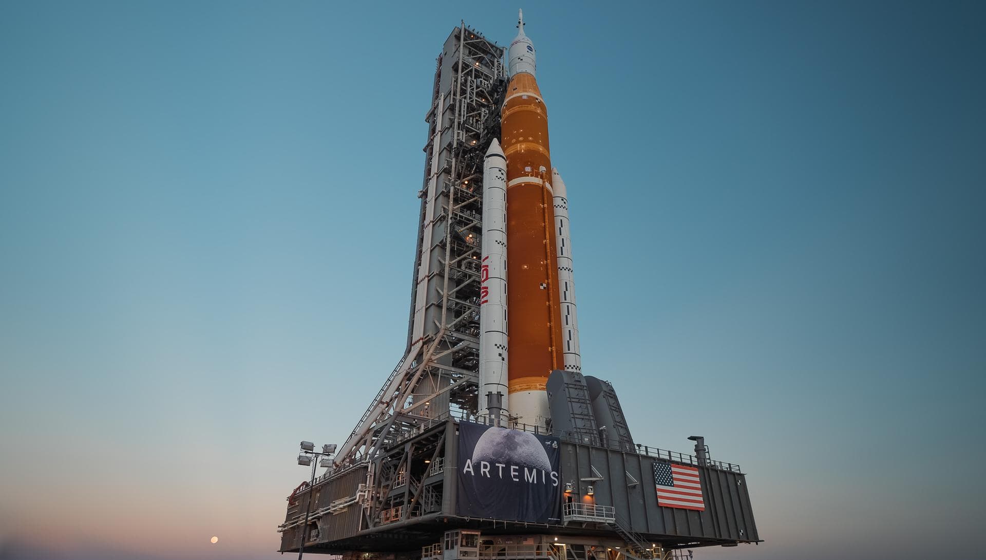 The Space Launch System (SLS) rocket and Orion Spacecraft roll out of the Vehicle Assembly Building (VAB) to Launch Pad 39B at NASA's Kennedy Space Center in Florida for the first time on March 17, 20