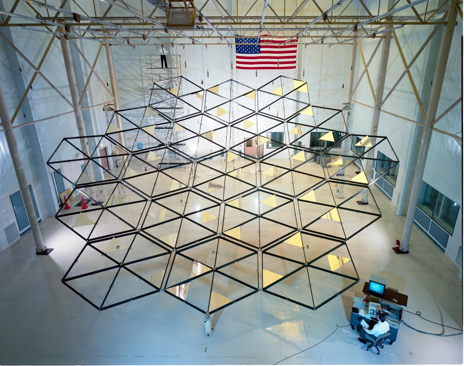 Testing of the Solar Dynamic Collector for Space Freedom. The solar dynamic power system includes a solar concentrator, which collects sunlight; a receiver, which accepts and stores the concentrated
