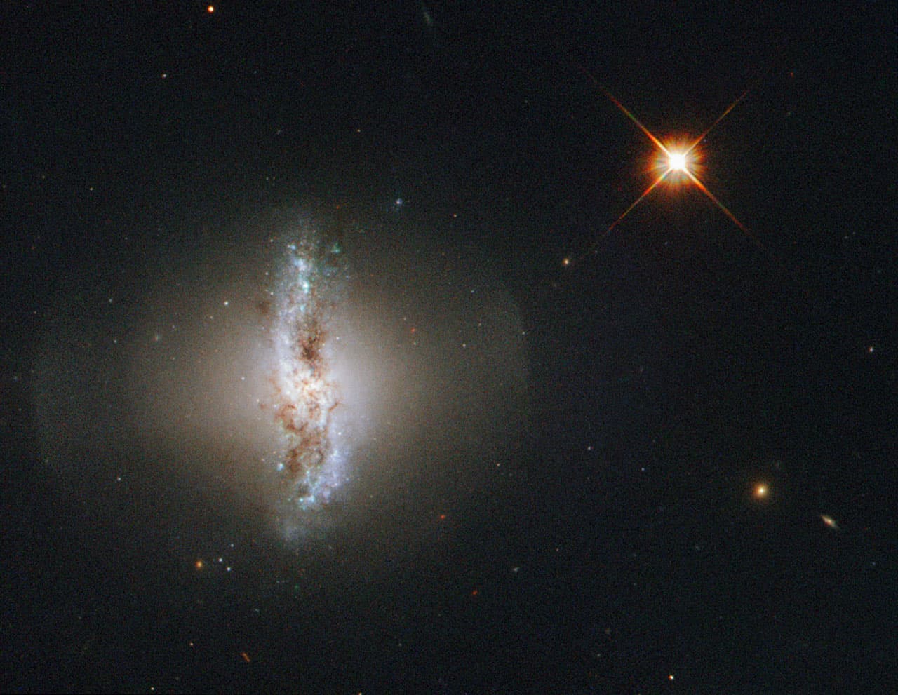 This Picture of the Week shows Arp 230, also known as IC 51, observed by the NASA/ESA Hubble Space Telescope. Arp 230 is a galaxy of an uncommon or peculiar shape, and is therefore part of the Atlas
