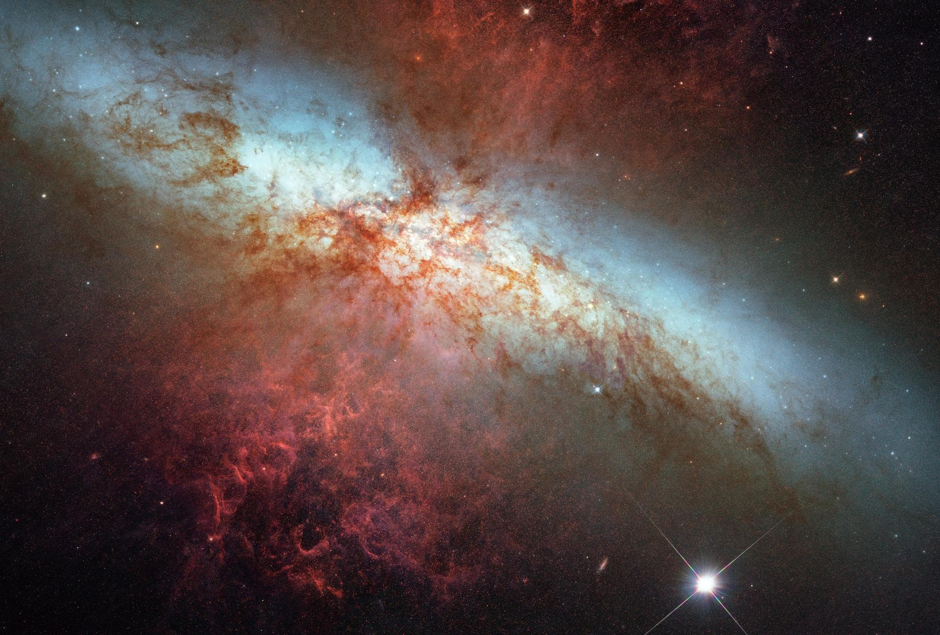 This is a Hubble Space Telescope composite image of a supernova explosion designated SN 2014J in the galaxy M82. At a distance of approximately 11.5 million light-years from Earth it is the closest su