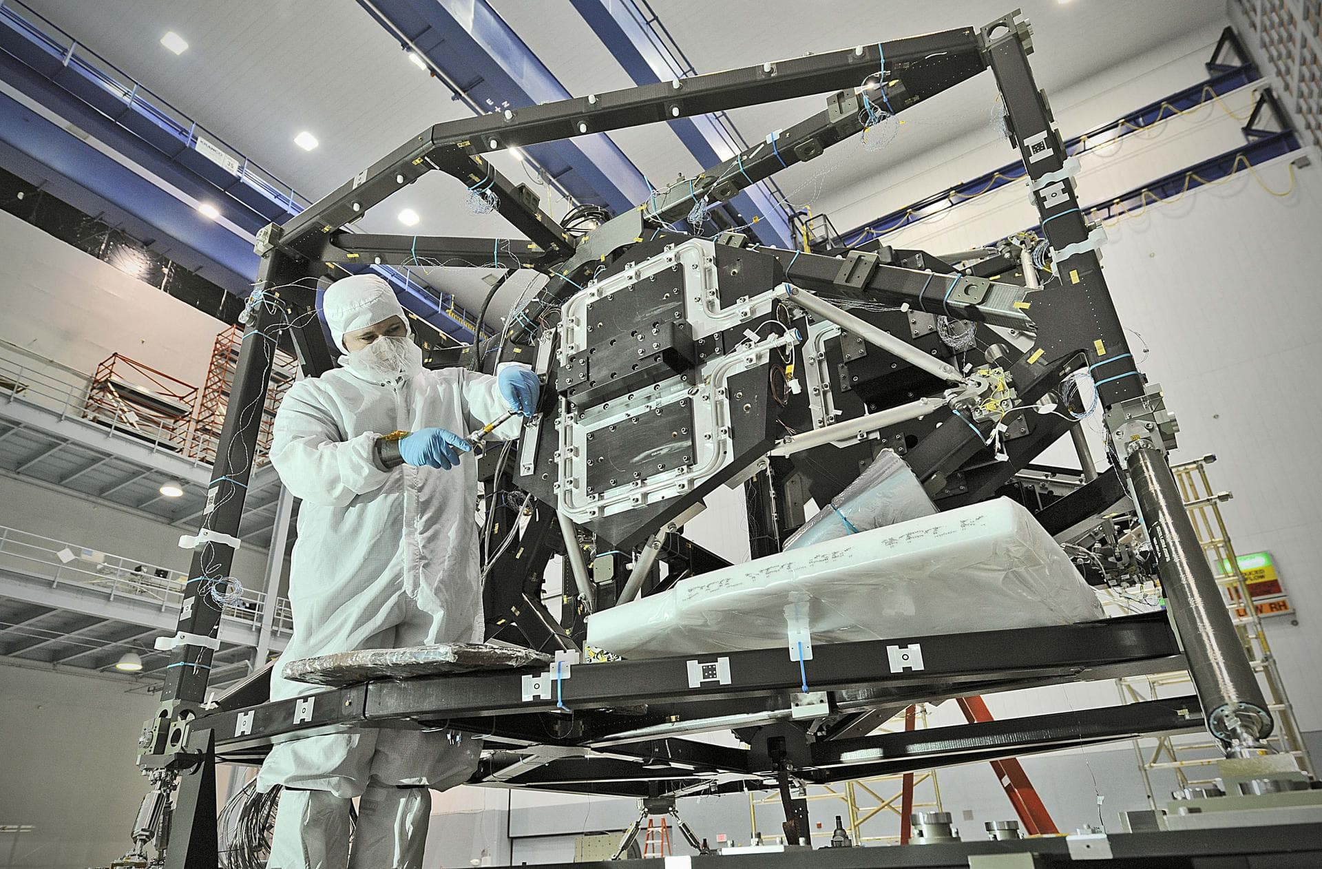 NASA image release September 17, 2010 In preparation for a cryogenic test NASA Goddard technicians install instrument mass simulators onto the James Webb Space Telescope ISIM structure. The ISIM Str