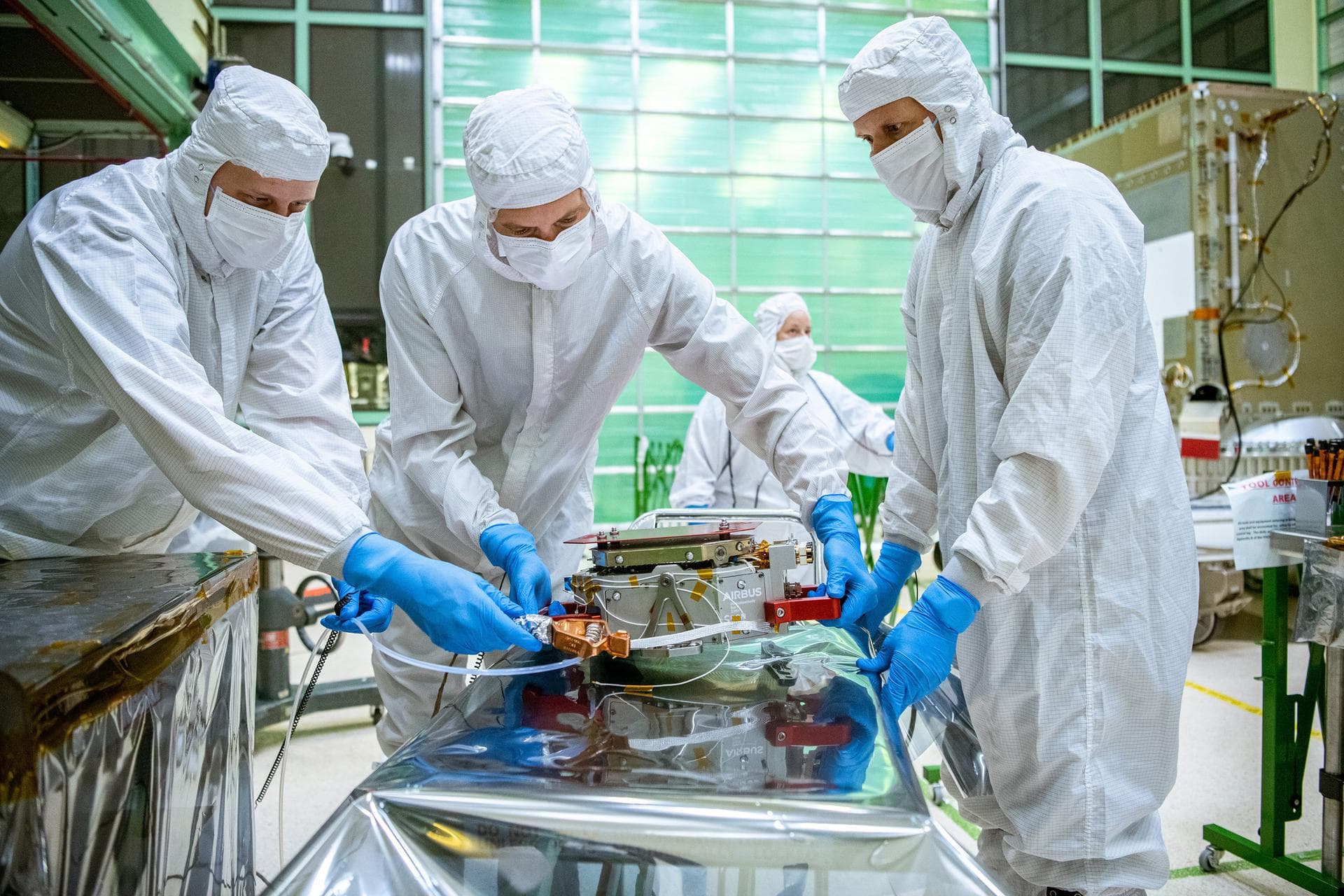 Engineers from SRON, the Netherlands Institute for Space Research, move the SPEXone instrument before it is integrated onto the Plankton, Aerosol, Cloud, ocean Ecosystem (PACE) Spacecraft at NASA Godd